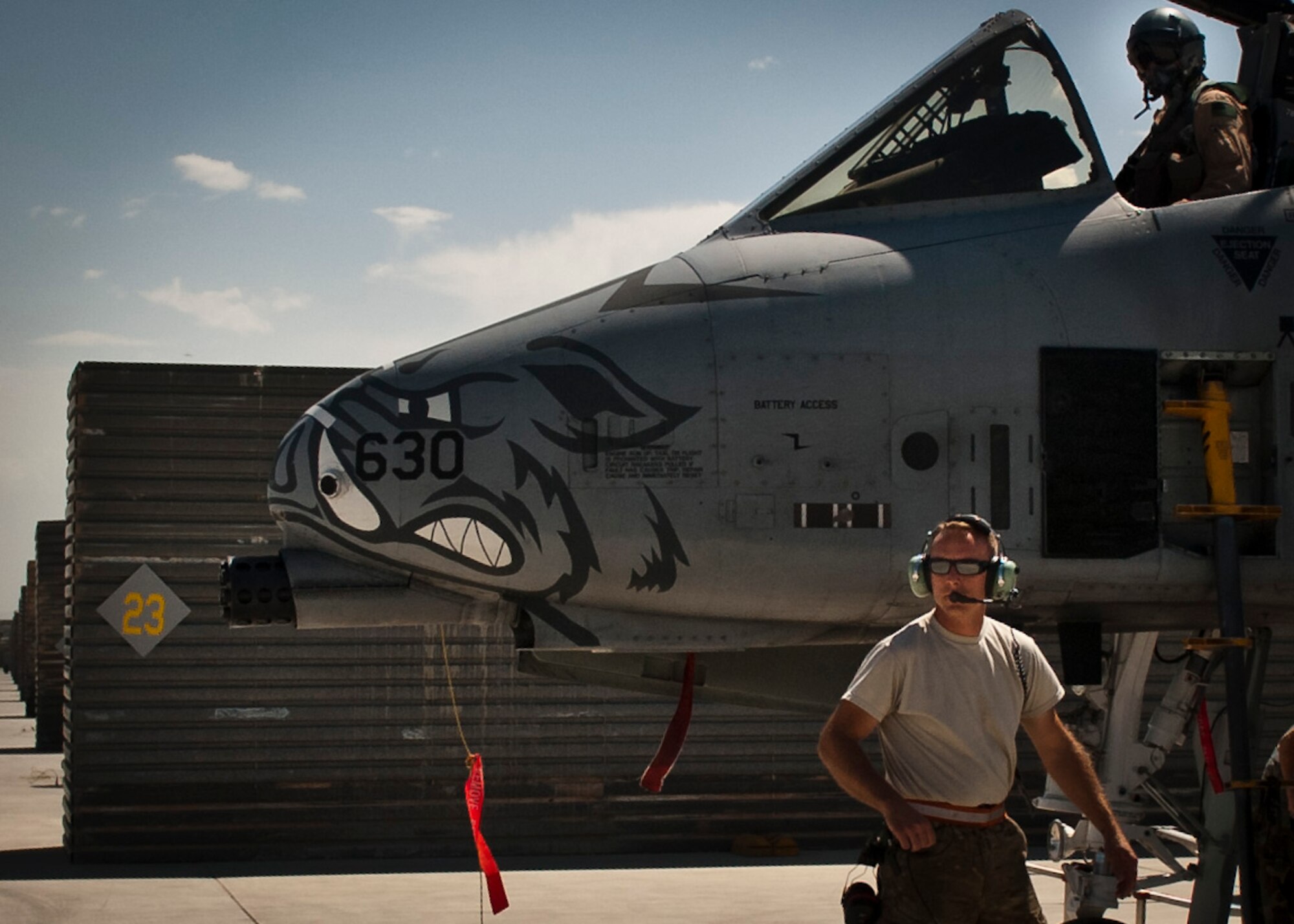 Airmen from the 455th Air Expeditionary Wing receive a A-10 Thunderbolt II after a mission at Bagram Airfield, Afghanistan, June 30, 2012. Affectionately called the ‘Warthog’, the A-10 is a specialized ground attack aircraft which provides close-air support to ground forces operating in Afghanistan. (U.S. Air Force photo/Capt. Raymond Geoffroy)