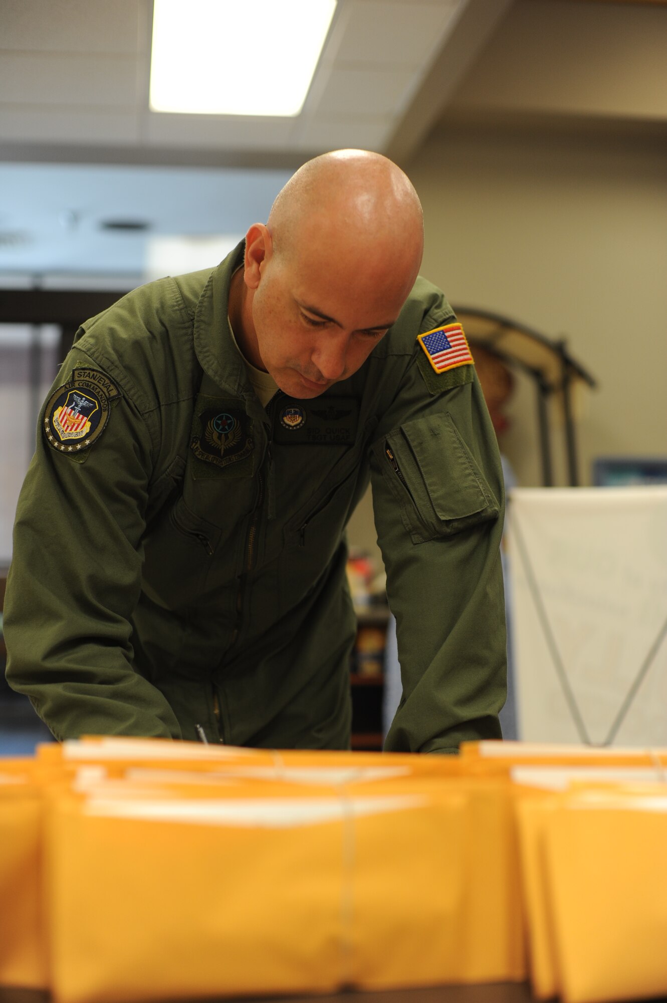 Tech. Sgt. Sid Quick, 1st Special Operations Group, fills out a registration form for the 
C.W. Bill Young Department of Defense Marrow Donor Program during a drive at the base commissary at Hurlburt Field, Fla., June 27, 2012. More than 500 Air Commandos and their families registered to donate bone marrow during a drive at the Hurlburt Field Base Exchange and Commissary June 25-29, 2012. (U.S. Air Force photo / Airman 1st Class Naomi Griego)(Released)
