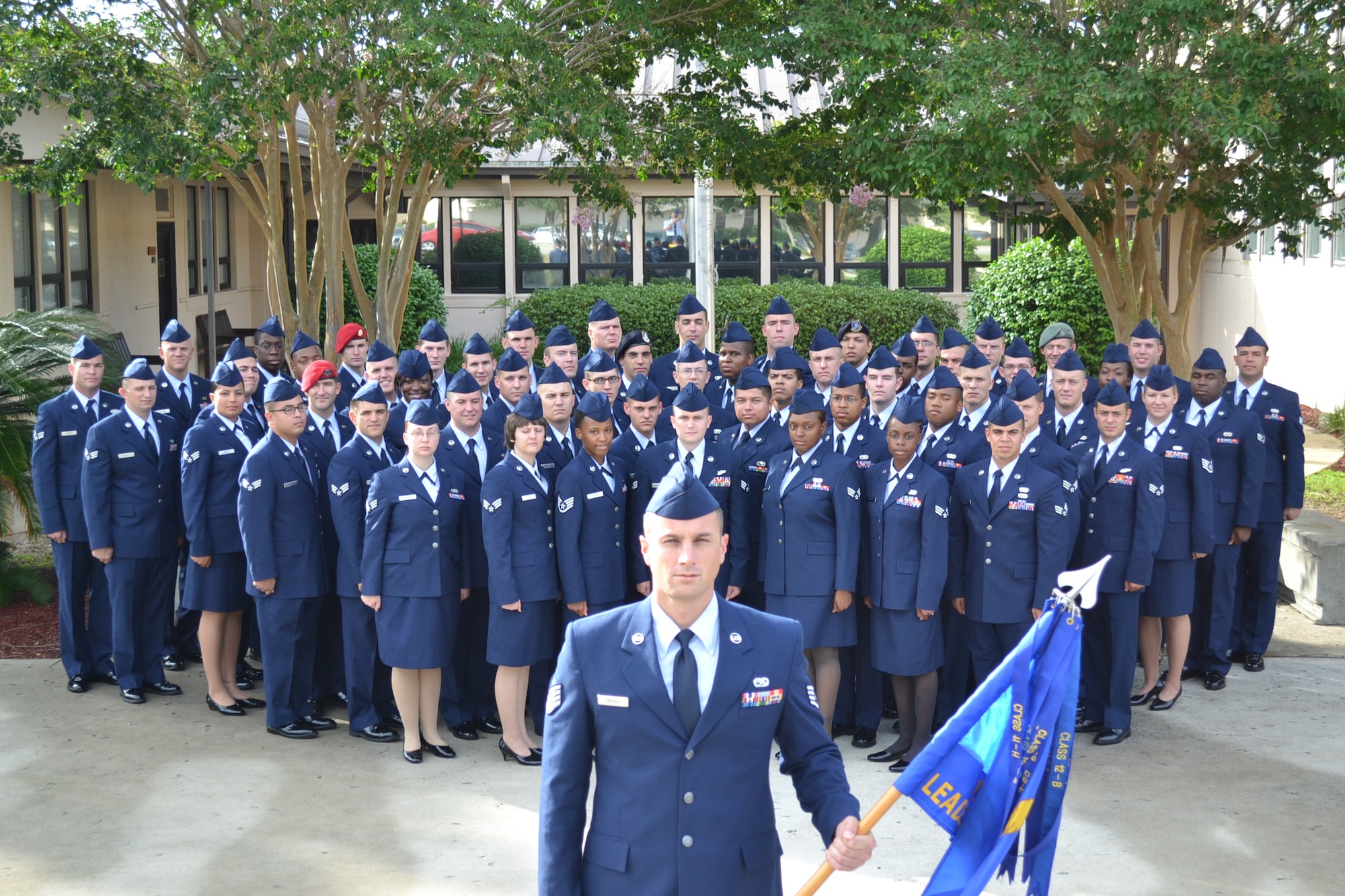 Staff sergeants and senior airmen from Class 12-E of the Vincent Airman Leadership School pose in front of the school at Hurlburt Field, Fla. The class graduated from ALS during a ceremony at the Soundside Club at Hurlburt Field, Fla., June 28, 2012. (Courtesy photo)