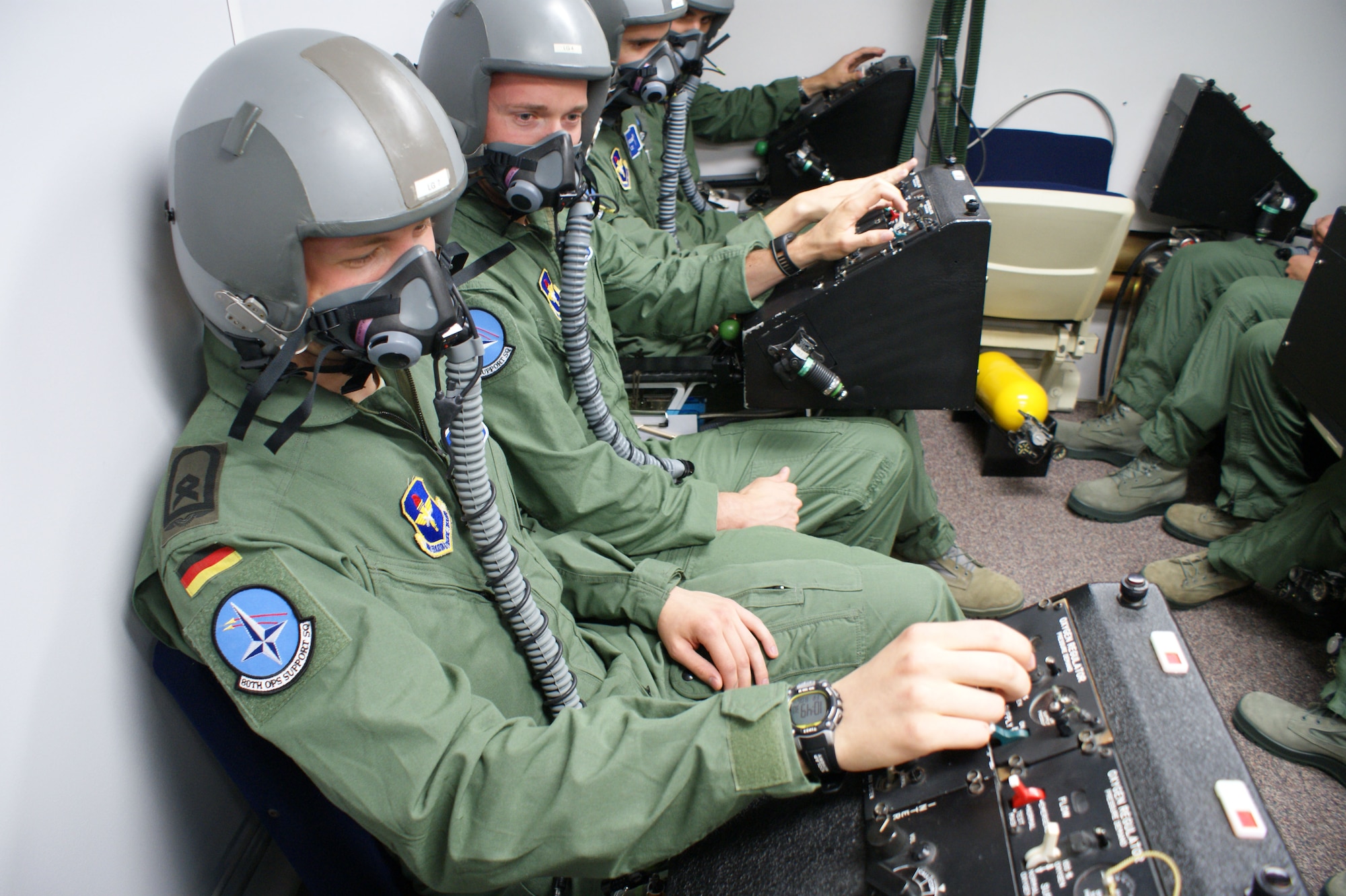 Students in the Euro-NATO Joint Jet Pilot training program get ready for an altitude chamber flight at Sheppard Air Force Base, Texas on Jun 15, 2012.  Learning to deal with hypoxia, or lack of blood to the brain and blood, is demonstrated through altitude chamber flights. (U.S. Air Force photo/Dan Hawkins)