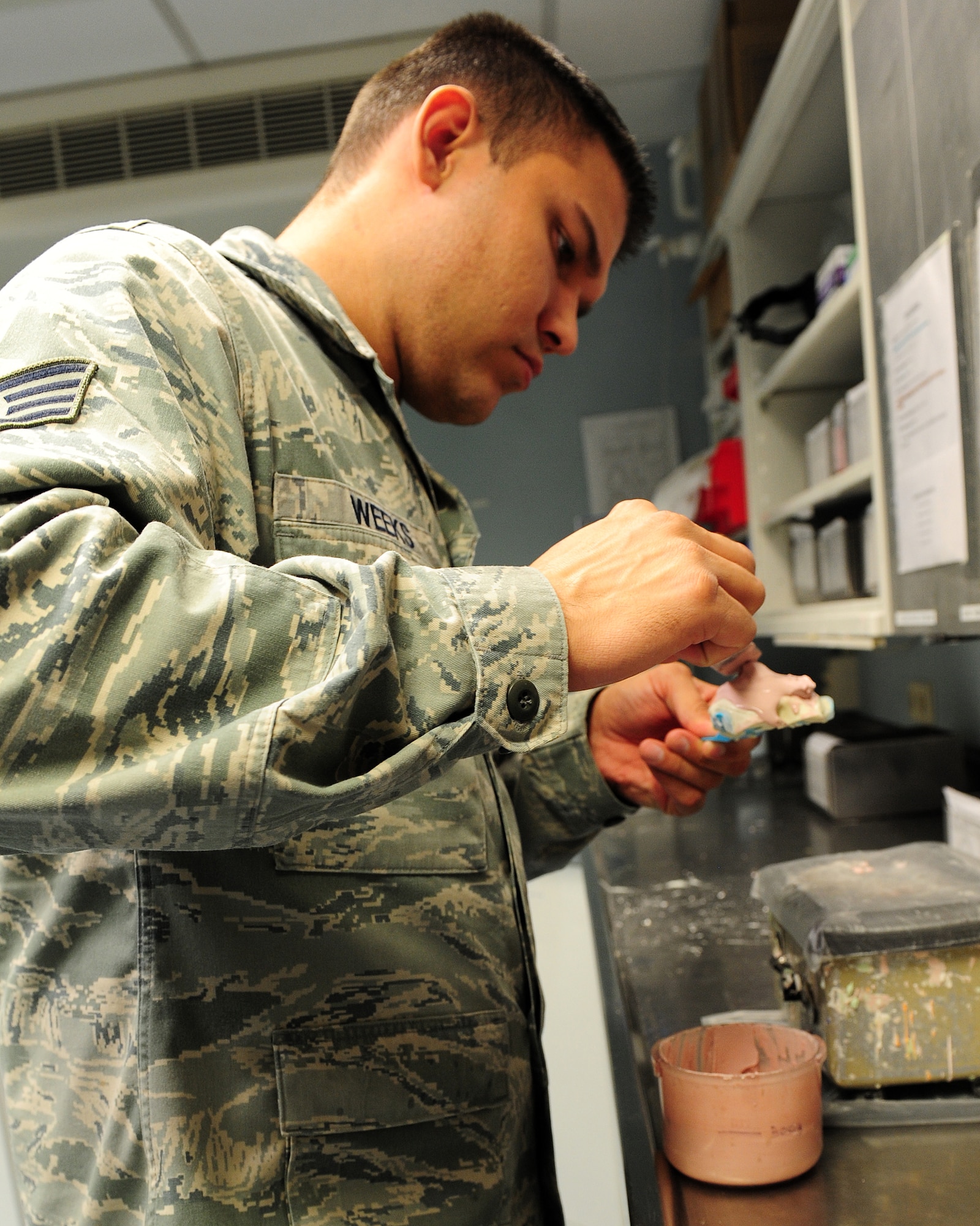 Staff Sgt. Brad Weeks, 86th Dental Squadron, dental laboratory technician, makes an alginate impression in the lab at the Dental Clinic on Ramstein Air Base, Germany, June 12, 2012.  (U.S. Air Force photo/Airman 1st Class Holly Cook)  
