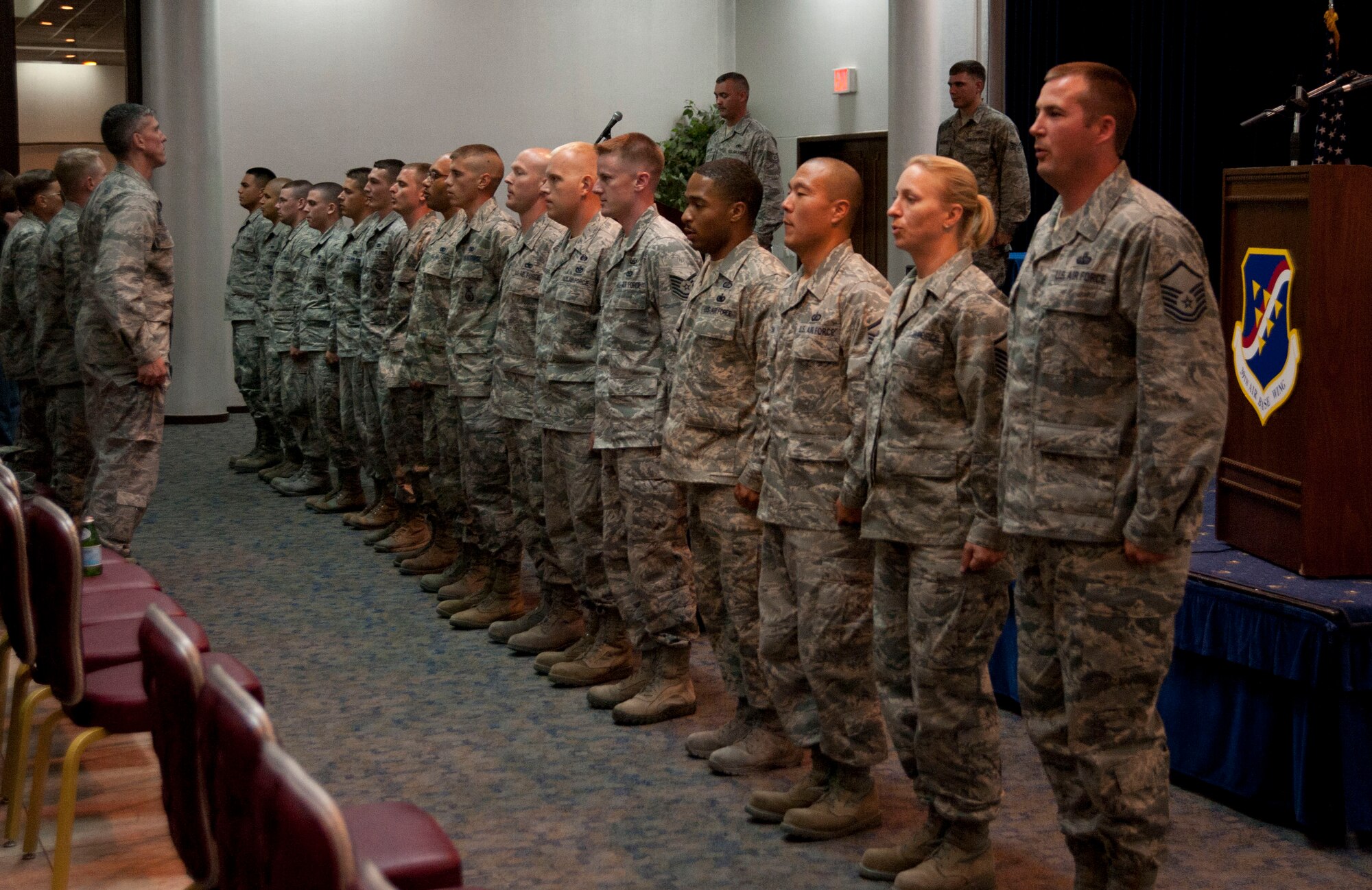 Sixteen Airmen were recognized for being promoted during a promotion ceremony June 29, 2012, at the Club Complex Ballroom at Incirlik Air Base, Turkey. (U.S. Air Force photo by Senior Airman Clayton Lenhardt/Released)