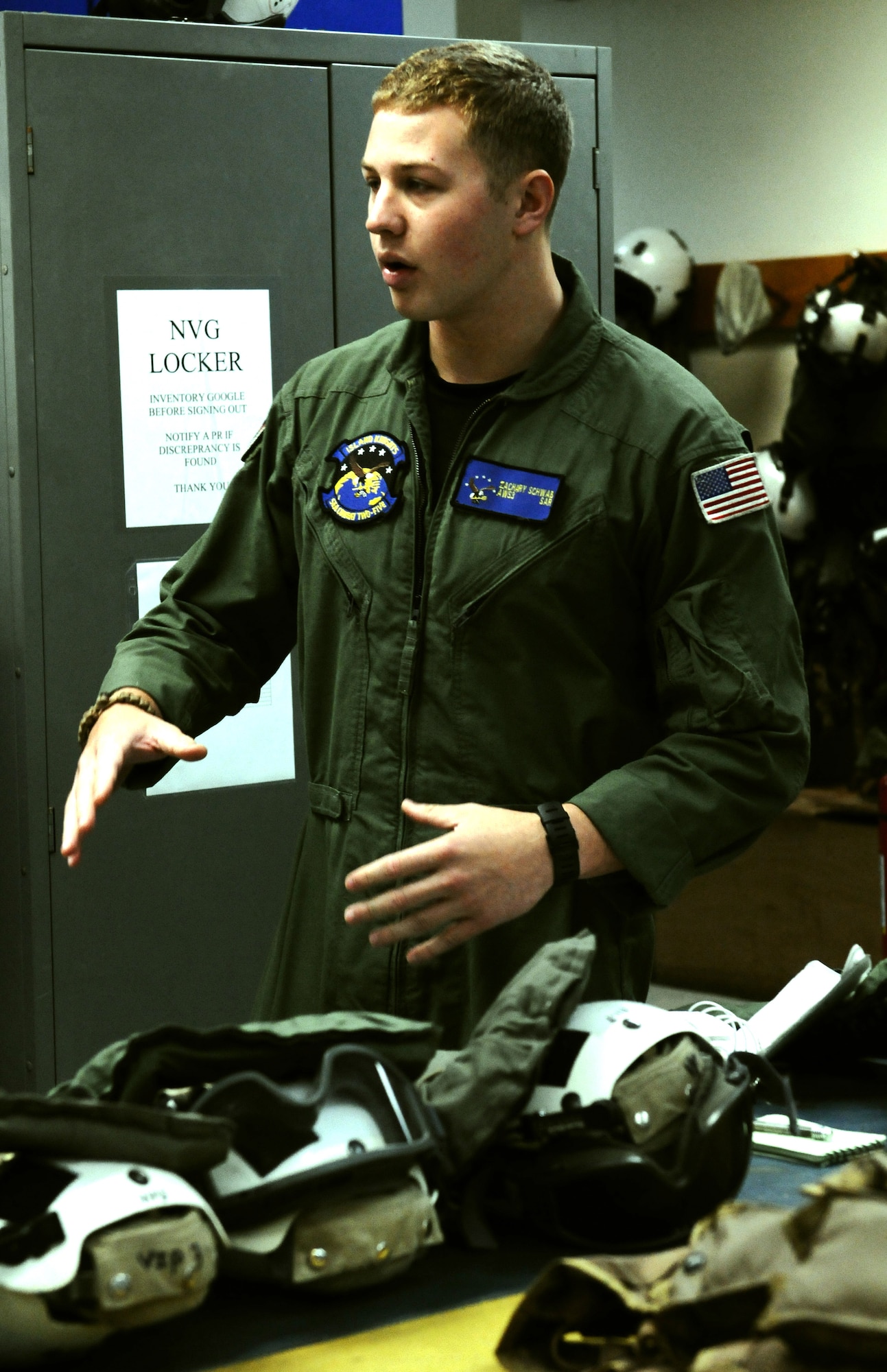 Naval Air Crewman 3rd Class Zack Schwab, Helicopter Sea Combat Two-Five search and rescue swimmer, briefs servicemembers before an incentive flight June 13. To this day, HSC-25 remains the only Naval Squadron located at Andersen. (U.S. Air Force photo/Airman 1st Class Mariah Haddenham/Released)