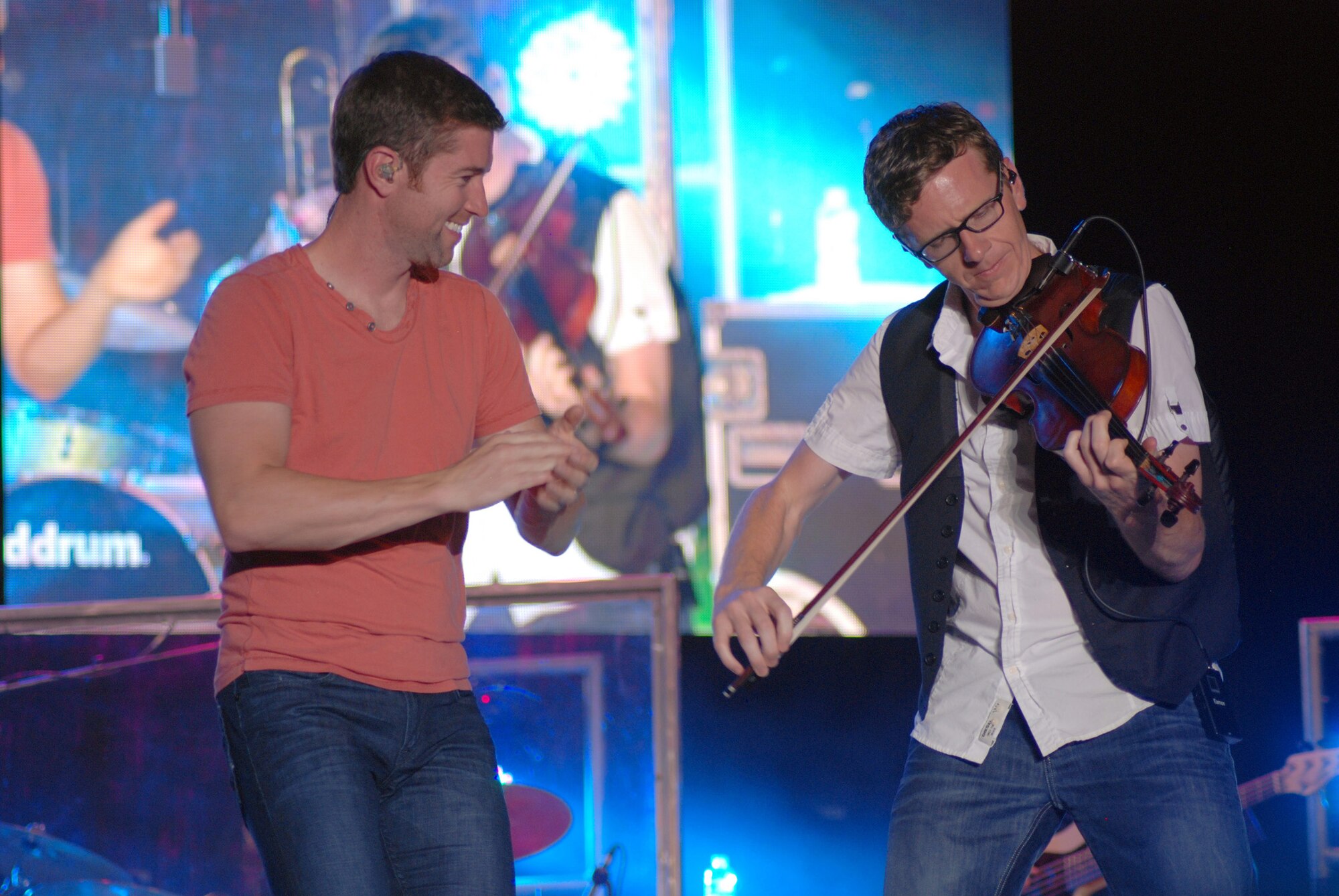 Country music superstar Josh Turner and fiddle player Eamon McGluughlin perform during the annual Independence Day Celebration at McConnell Talbert Memorial Stadium in Warner Robins, Ga., July 2. (U.S. Air Force photo/Bo Joyner)