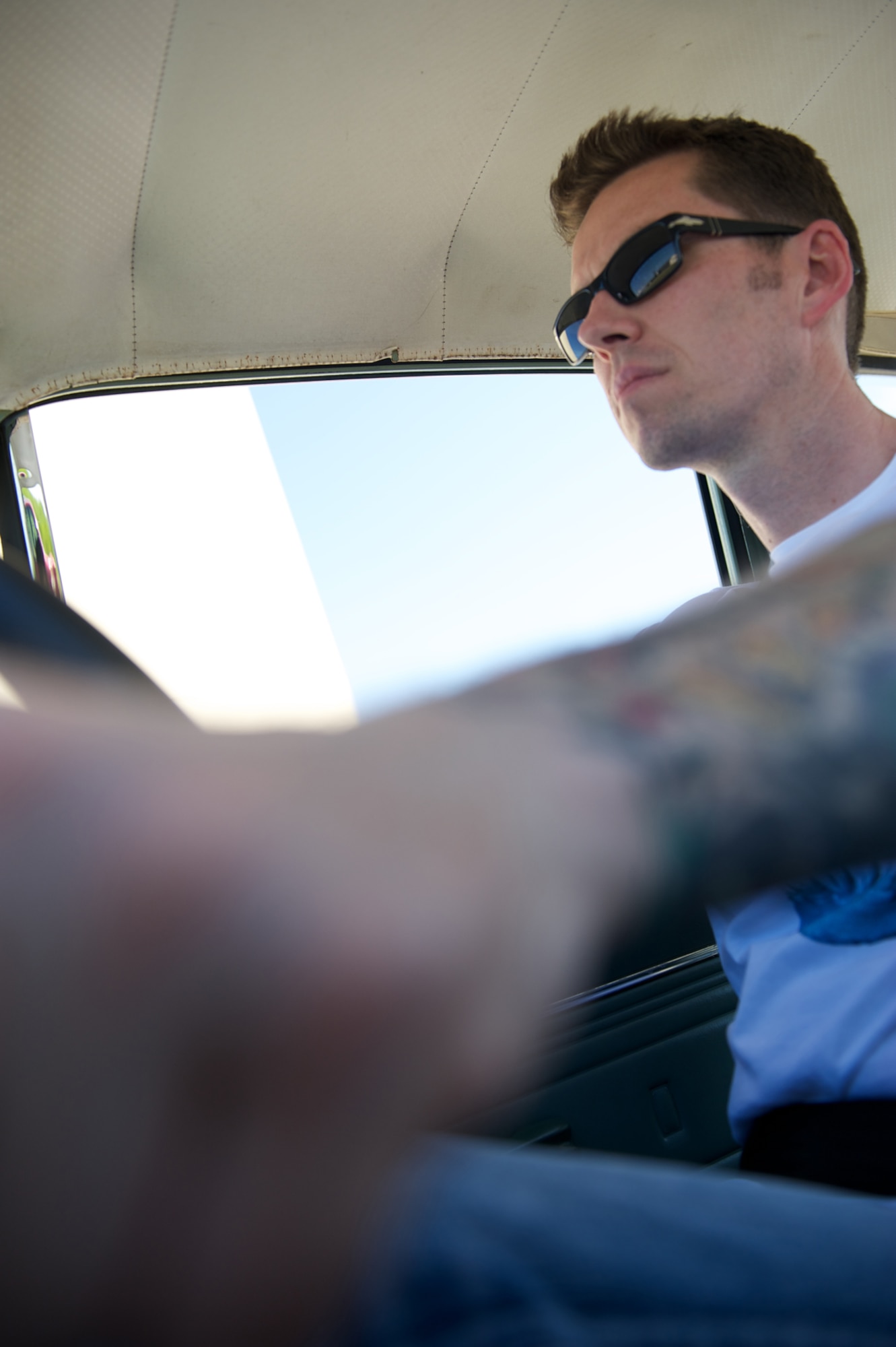 JOINT BASE ELMENDORF-RICHARDSON, Alaska -- Tech. Sgt. Danny Damons, 3rd Operations Support Squadron, grabs a gear in his 1966 Ford Cortina June 22 at JBER. (U.S. Air Force photo/David Bedard)