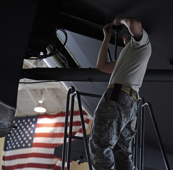 Airman 1st Class Michael Romanyak, 2nd Maintenance Squadron, checks a discrepancy on a B-52H Stratofortress in the Phase Hangar on Barksdale Air Force Base, La., July 2. Before a B-52 can fly, it has to have all of its discrepancies cleared. Romanyak enjoys riding dirt bikes and competing in local Motocross competitions in his spare time. According to Romanyak the activity helps him come back to work refreshed and ready to go. (U.S. Air Force photo/Airman 1st Class Micaiah Anthony)(RELEASED)