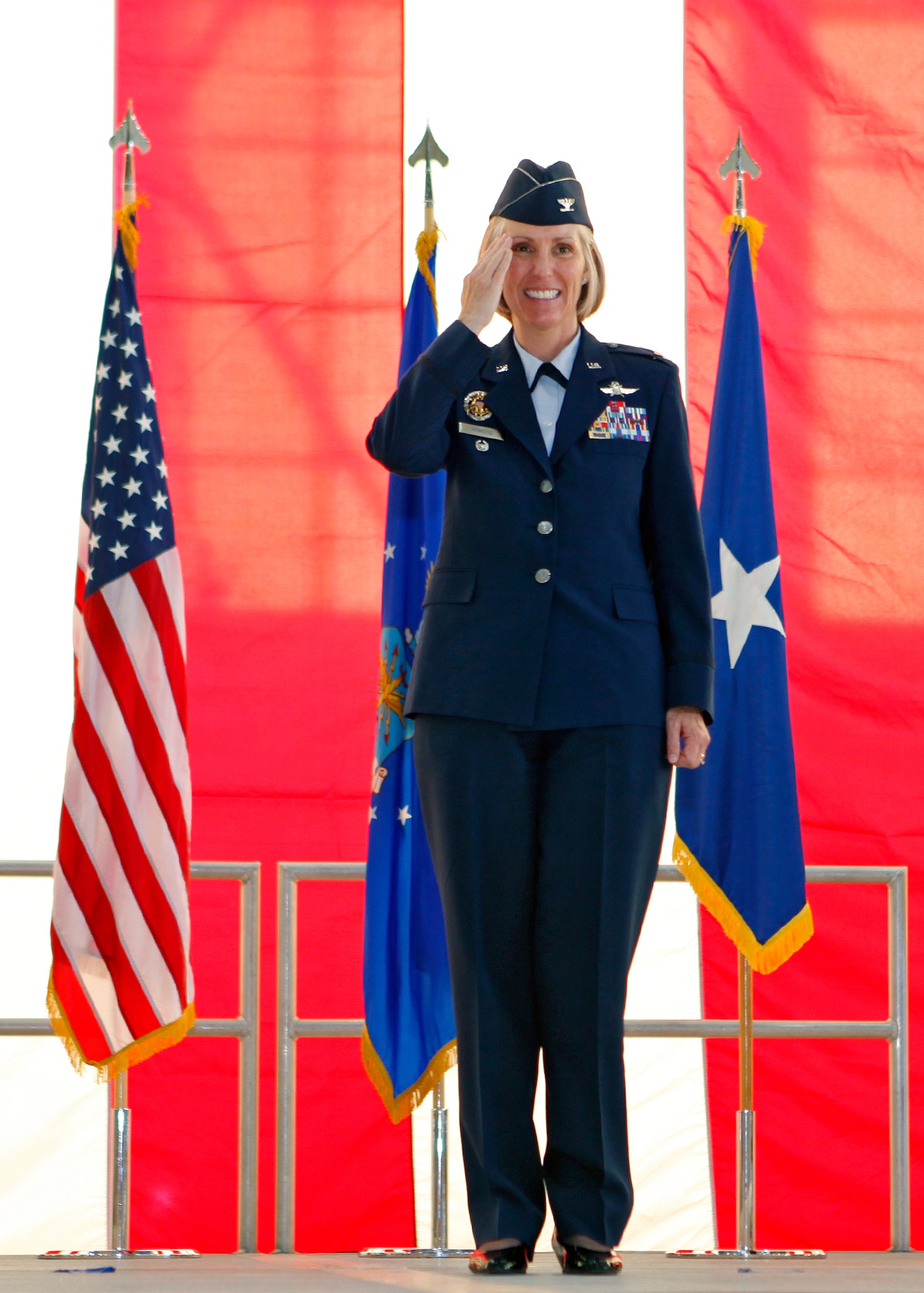 Col. Amy V. Arwood receives her first salute as commander of the 95th Air Base Wing June 29 at the change of command ceremony held in Hangar 1600. (U.S. Air Force Photo by Jet Fabara)