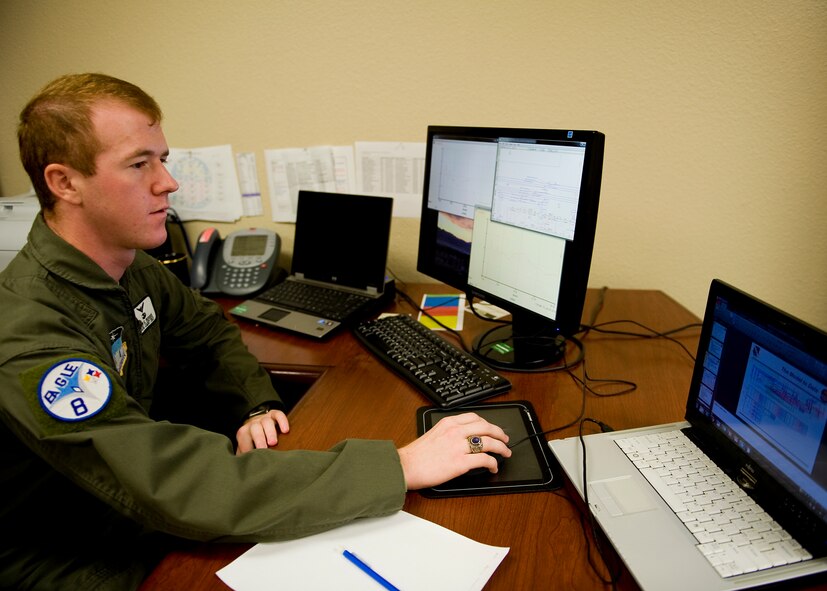 U.S. Air Force Academy Cadet Tyler Meirose works on the development of a computer-based simulator to help project short- and long-term effects of changes to manpower, equipment and more within the B-1 Community. Through the U.S. Air Force Academy Cadet Summer Research Program, Cadet Meirose worked five weeks with the 337th Test and Evaluation Squadron to help develop the simulator. The 337th TES is seeking sponsorship for the project from the Air Force to develop the code and flush out the bugs, and is at the point where they’re consulting with the Rand Corporation, who’s expressed interested in developing the model. (U.S. Air Force photo by Airman 1st Class Damon Kasberg/Released)