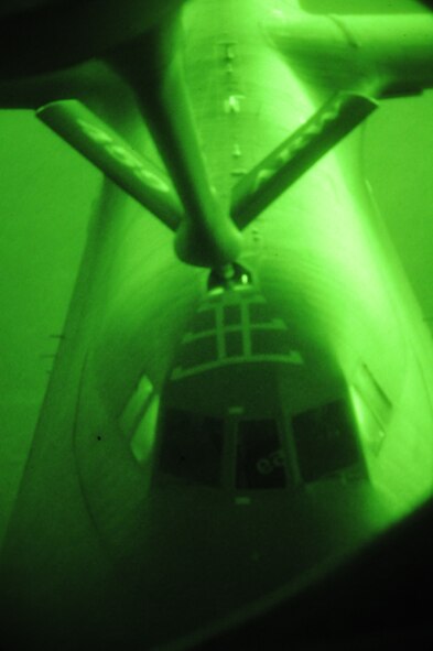 The boom of a KC-135 Stratotanker of the 459th Air Refueling Wing makes contact with a Lockheed C-5 Galaxy aircraft of the 356th Airlift Squadron from 22,000 feet in the air, June 28. The KC-135 crew is assisting the 356th AS for a business effort where new C-5 pilots get qualified on aerial refueling. (U.S. Air Force photo/Senior Airman Katie Spencer)