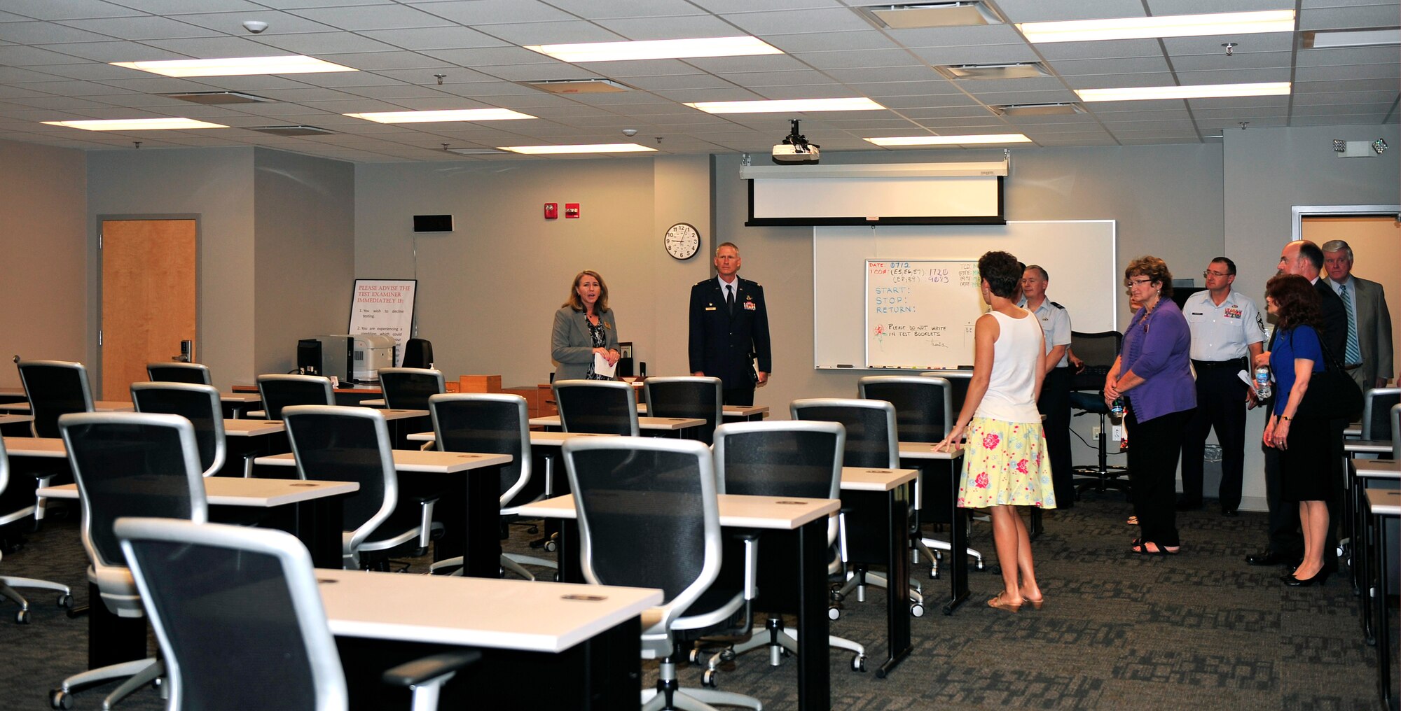 Col. David Almand, 375th Air Mobility Wing commander, tours the reconstructed Consolidated Education, testing and training center and Student union after the grand opening on Scott Air Force Base, Ill June 2, 2012. The Student Union, the first in Air Mobility Command, came as a way to support and reinforce the ideas found in the Comprehensive Airman Fitness philosophy, and provide a new place for Team Scott members and students to use for recreational activities and studying. Also inside the educational center will was reconstructed to provide three more classrooms and a Cafe that will open in mid-August. (U.S. Air Force photo/ Staff Sgt. Stephenie Wade)