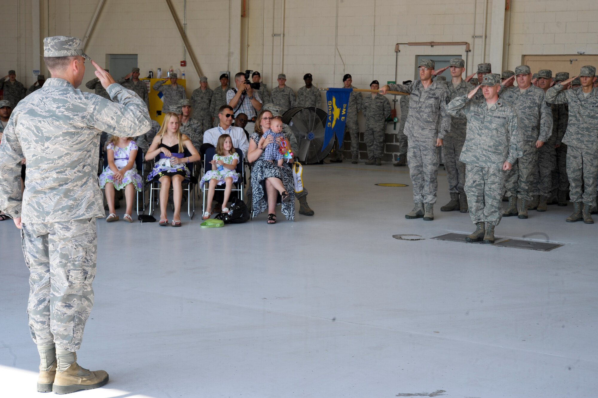 U.S. Air Force Lt. Col. Robert Coxwell, former 3d Weather Squadron commander, receives a final salute from the squadron during the change of command ceremony at Fort Hood, Texas, June 26, 2012. Coxwell will go on to be a director of staff at Joint Base Charleston, S.C. (U.S. Air Force photo by Staff Sgt. Joshua J. Garcia/Released)  