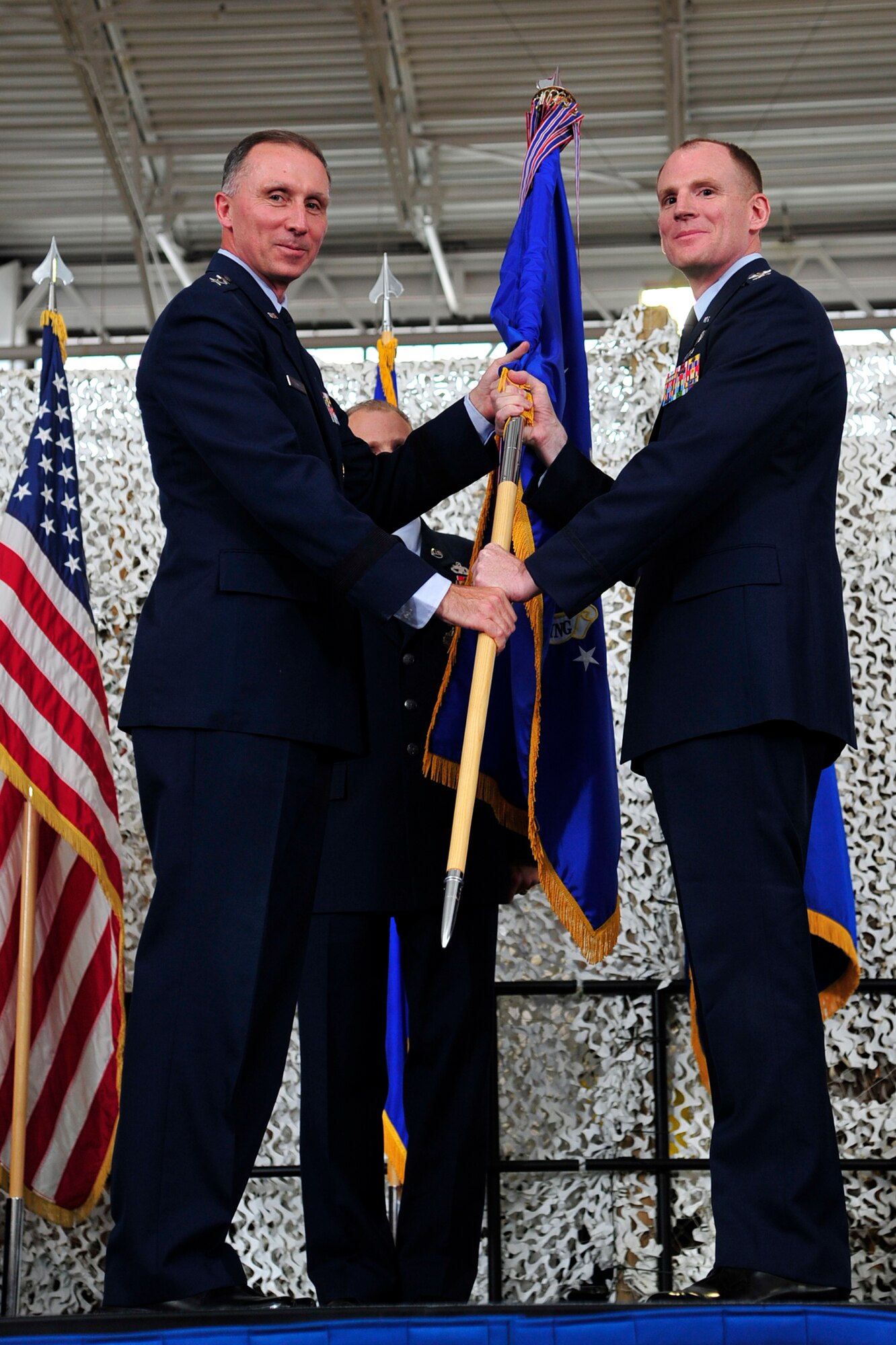 Col. Martin A. Chapin receives command of the 621st Contingency Response Wing from Maj. Gen. William J. Bender, commander, U.S. Air Force Expeditionary Center, in a ceremony at the 621st Contingency Response Wing’s Global Reach Deployment Center June 28 at Joint Base McGuire-Dix-Lakehurst, N.J. Chapin took command from Col. Chris B. Patterson, who will be moving to the USAF EC. (U.S. Air Force photo/Tech. Sgt. Parker Gyokeres)