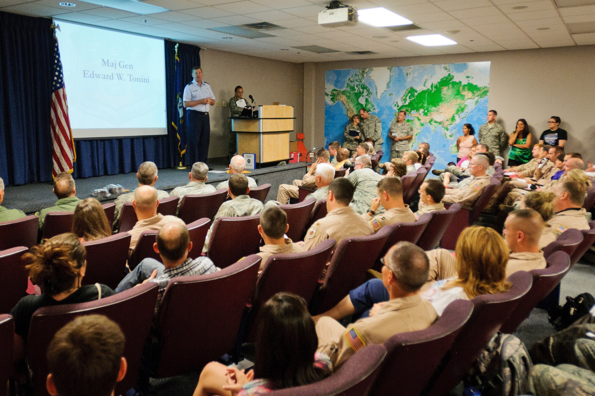 Maj. Gen Edward W. Tonini, adjutant general of the Commonwealth of Kentucky, speaks to deploying Kentucky Air National Guardsmen and their families prior to departure at the Kentucky Air National Guard Base in Louisville, Ky., on July 2, 2012. The 123rd Airlift Wing deployed 70 Airmen and two C-130 aircraft to the Persian Gulf region in support of operations Enduring Freedom and New Dawn. (U.S. Air Force photo by Master Sgt. Phil Speck)