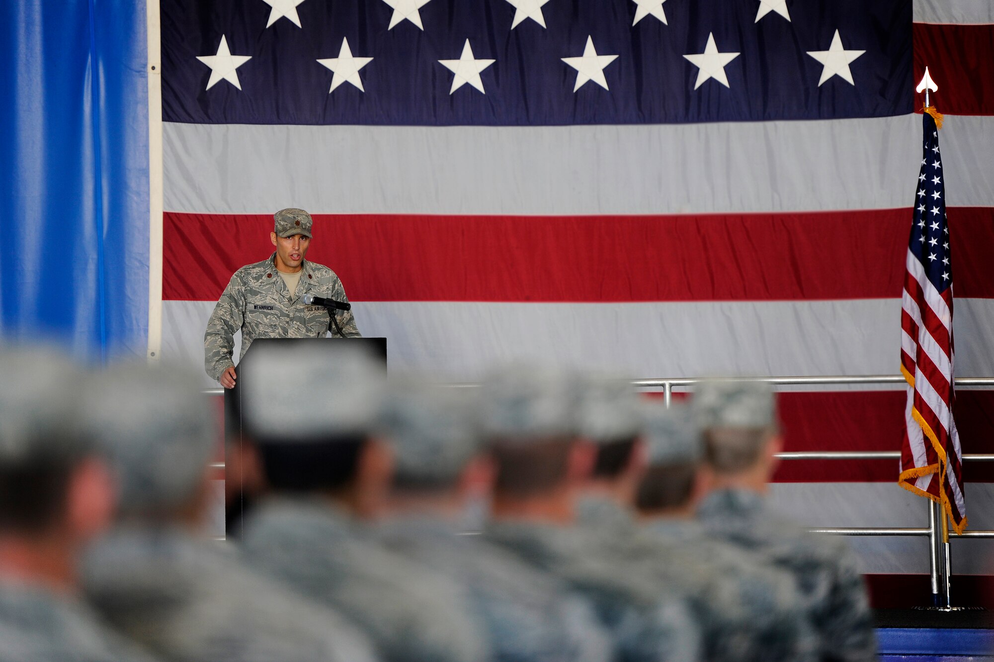 U.S. Air Force Maj. Joshua Wennrich, 20th Equipment Maintenance Squadron commander, speaks to the Airmen assigned to his squadron for the first time during a change of command ceremony, June 29, 2012, Shaw Air Force Base, S.C. Lt. Col. James Smith relinquished command to Maj. Joshua Wennrich. Wennrich arrived at Shaw from Royal Air Force Lakenheath Air Base, England. (U.S. Air Force photo by Senior Airman Kenny Holston/Released) 