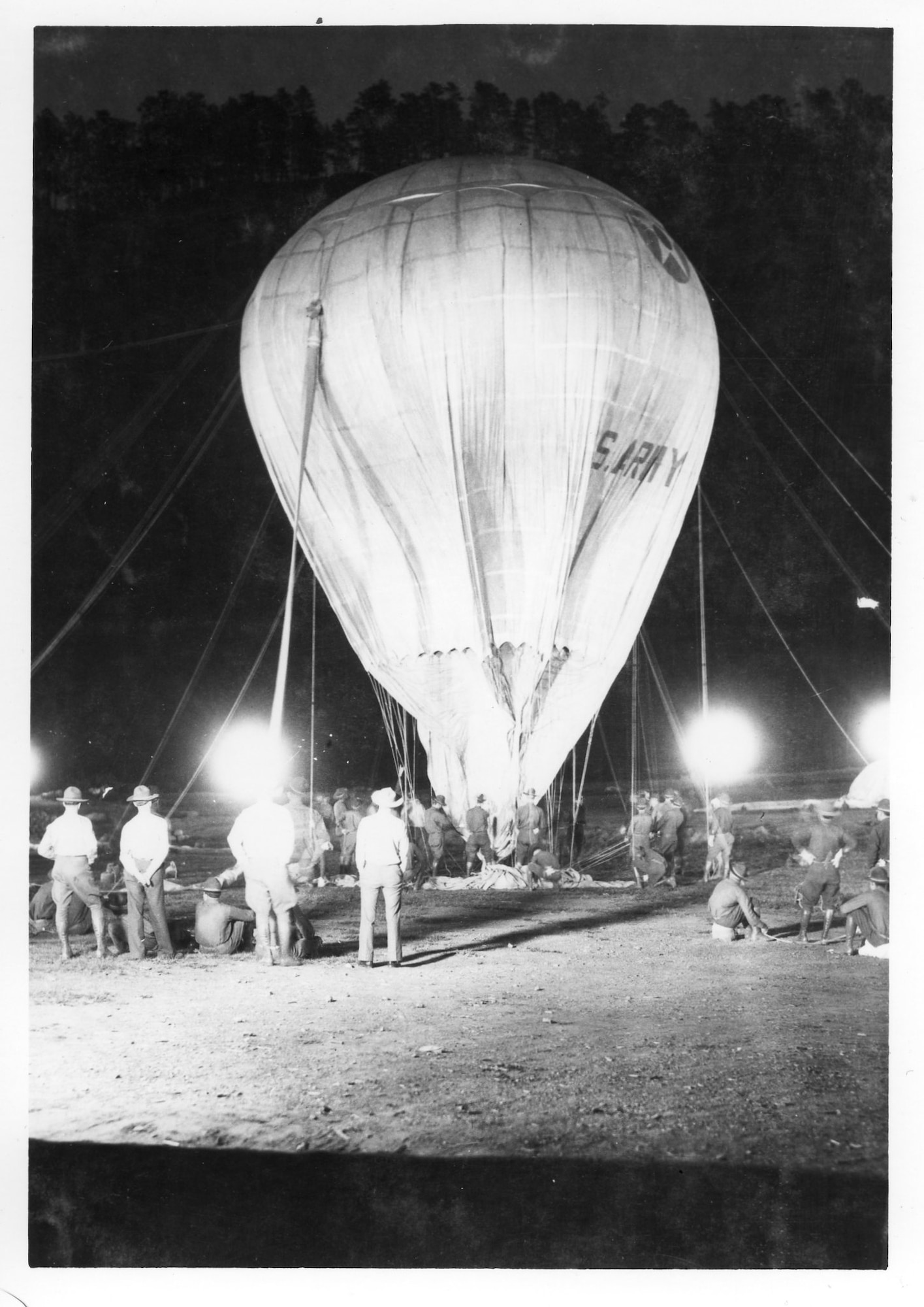 Explorer I's balloon is inflated July 28, 1934, at the Stratobowl in Rapid City, S.D., prior to being launched in an attempt to reach new heights in the atmosphere and study the human body's reaction to high altitude stressors. The balloon was filled with 210,000 cubic feet of hydrogen gas using canvas tubes during a process that took six hours. (U.S. Air Force courtesy photo/Released)