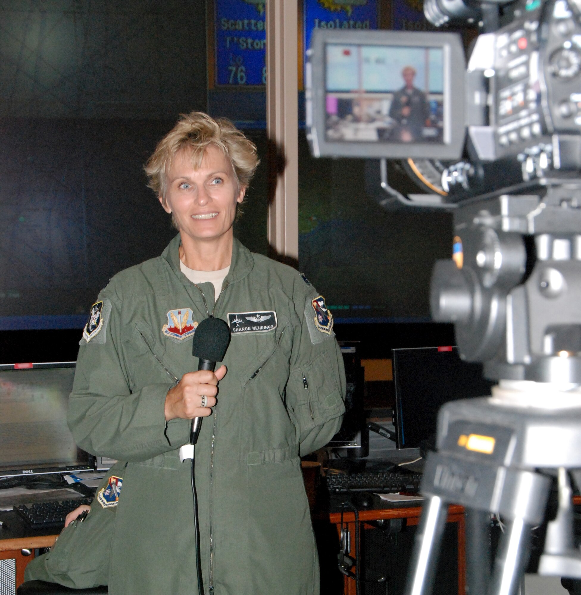 Lt. Col. Sharon Nehrings, a senior air defense officer at the 601st Air and Space Operations Center, talks about the AOC's mission during a virtual video  tour on the operations floor. Virtual video tours like this one are a way for  the 601st AOC to share its mission around the world. (U.S. Air Force photo/Maj. Steve Burke)
