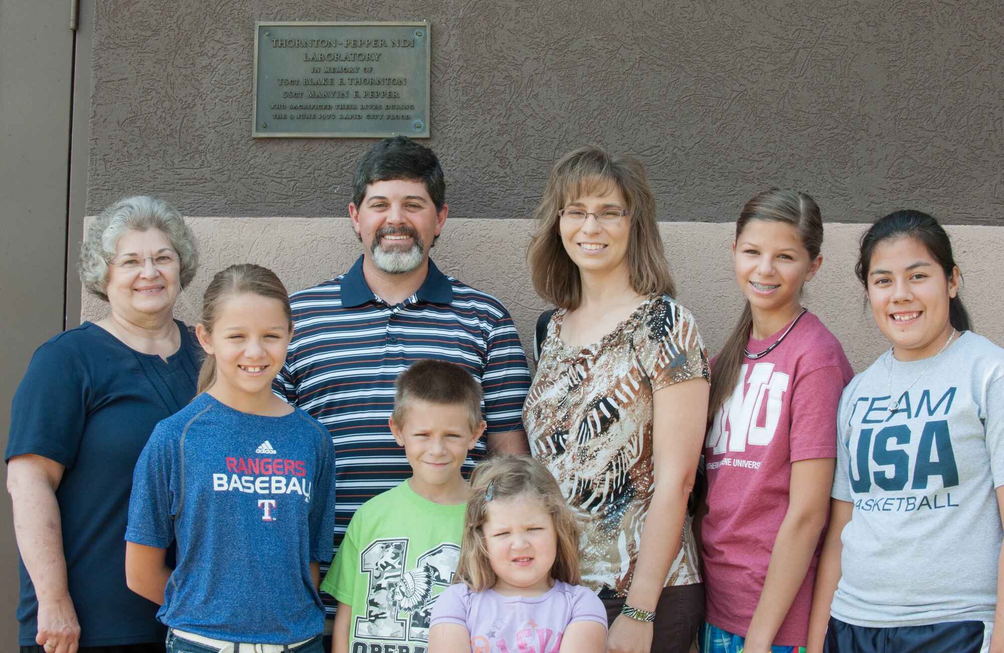 Janet Pepper and her son, Marvin toured the 28th Maintenance Squadron Non-Destructive laboratory – a building that bears the name of the fallen husband and father, Staff Sgt. Marvin Pepper, at Ellsworth Air Force Base, S.D., June 28, 2012. Sergeant Pepper was killed while assisting with rescue efforts during the 1972 flood. (U.S. Air Force photo by Airman 1st Class Zachary Hada, Released)