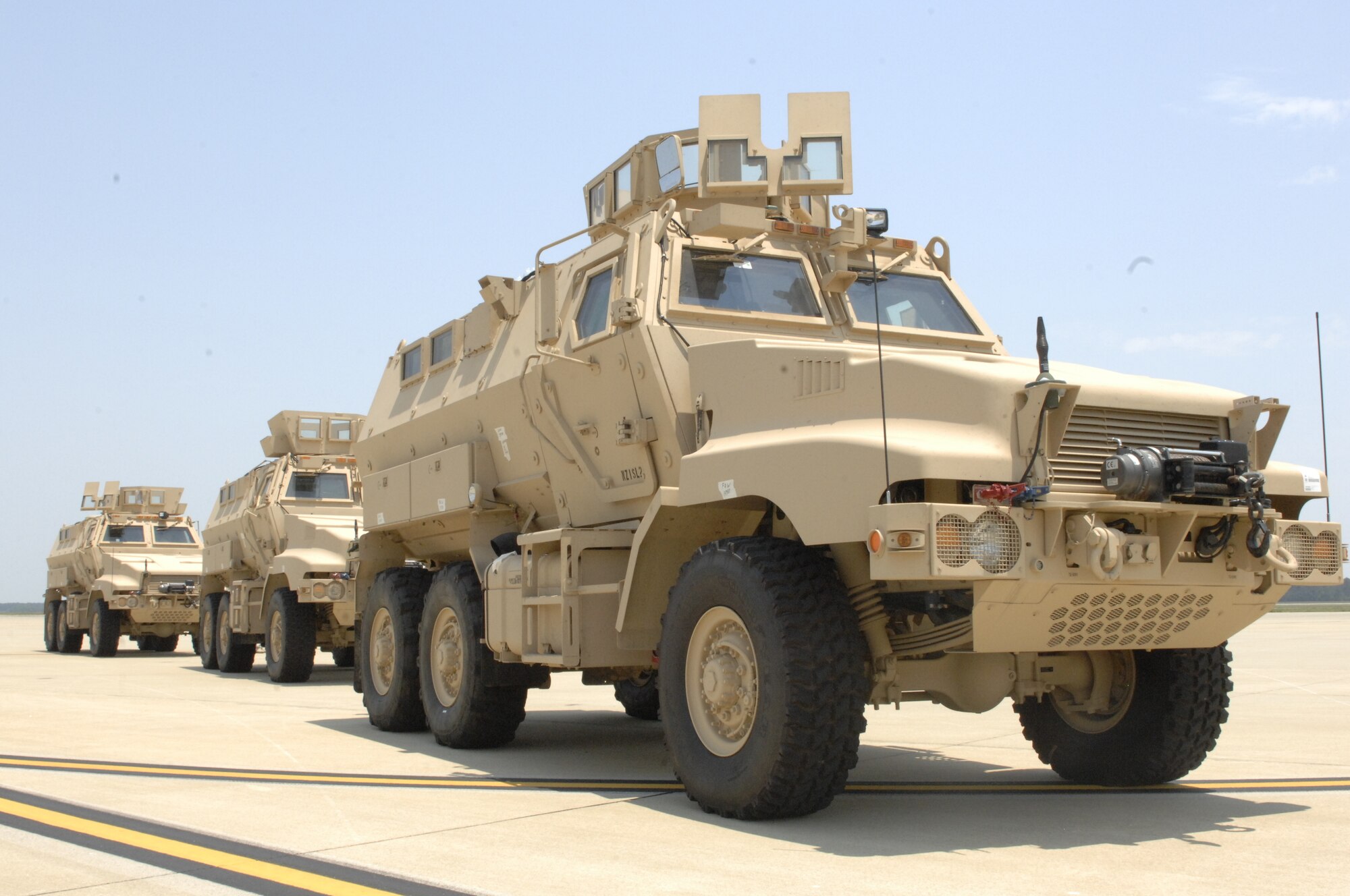 Three mine-resistant ambush-protected vehicles are loaded on to a Russian Antonov An-124 Ruslan by the 20th Logistics Readiness Squadron at Shaw Air Force Base, S.C., June 30, 2012. Two communication satellites and additional supplies, which weighed a total of 135,000 pounds, were also loaded on to the plane. The cargo’s destination is the 8th Army in the Republic of Korea. (U.S. Air Force photo by Airman 1st Class Krystal Jeffers/Released)
