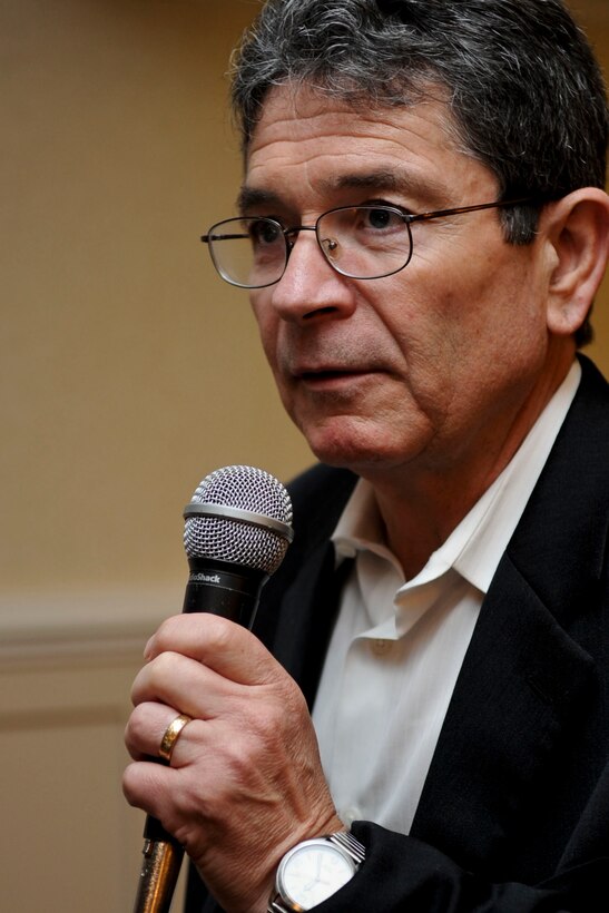 Harold G. Koenig, M.D., the director of the Center for Spirituality, Theology and Health at Duke University Medical Center, addresses military chaplains and guests in attendance at the Joint Base Langley-Eustis Unit Ministry Team's Spiritual Symposium at the Point Plaza Suites in Newport News, Va., June 19, 2012. During the symposium, attendees learned how to better help Service members and families dealing with combat stress, post-traumatic stress disorder, or upcoming or past deployments. (U.S. Air Force photo by Senior Airman Wesley Farnsworth)
