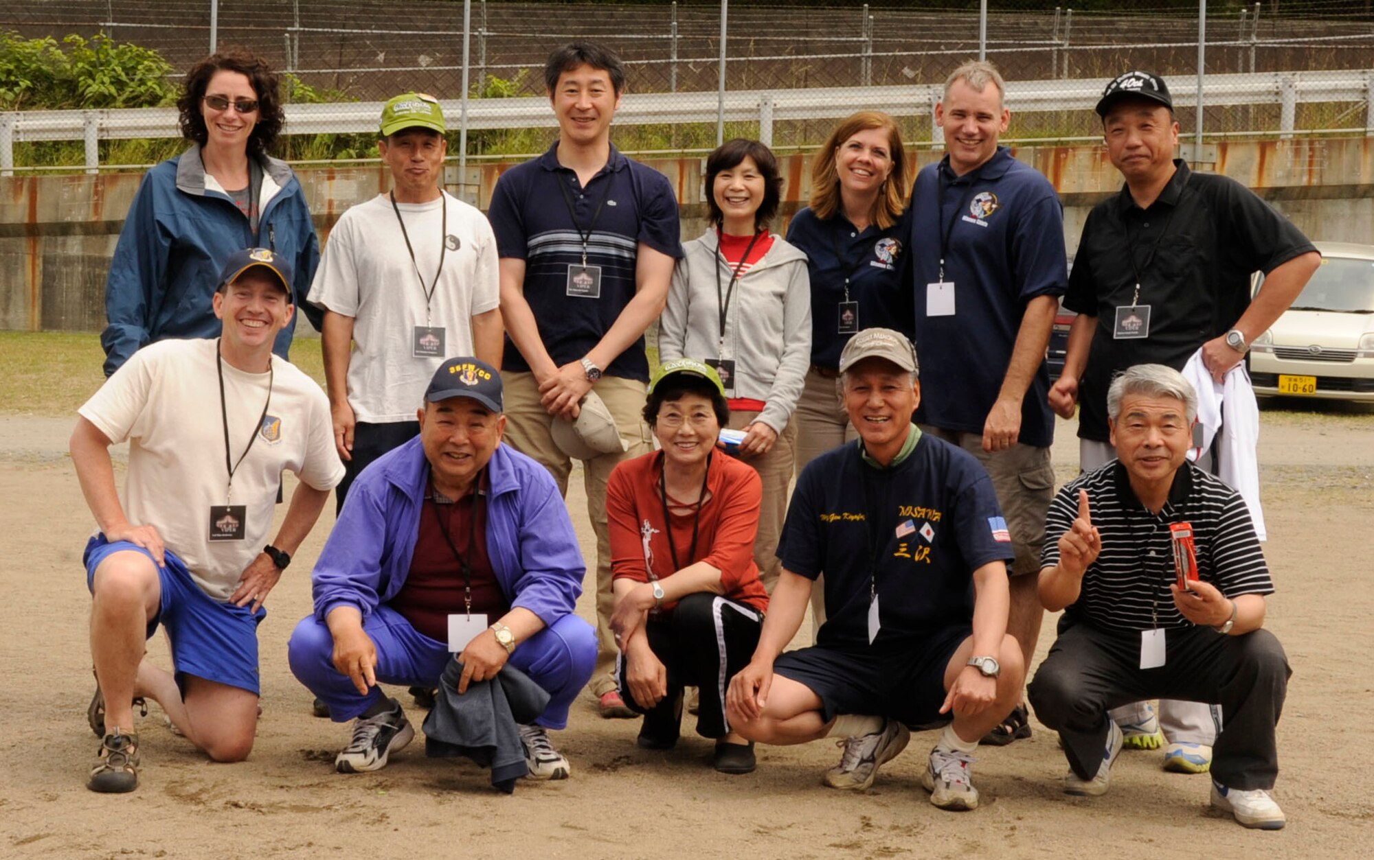 Team Viper poses for a picture after winning second place during Sports Day at Misawa Air Base, Japan, June 30, 2012. Team Viper finished with a score of 24 finishing 5 points ahead of Team Mustang after competing in four different games. (U.S. Air Force photo by Airman 1st Class Kaleb Snay/Released)