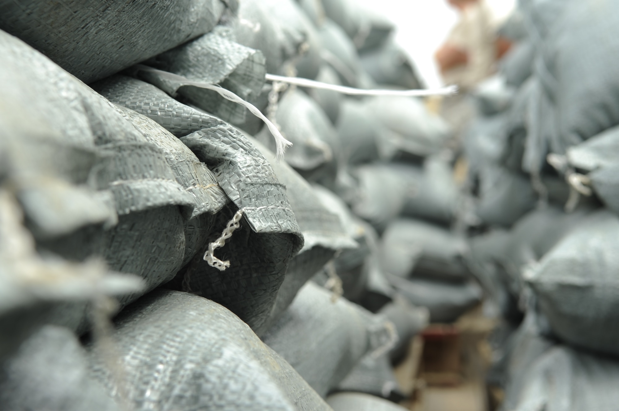 Bags filled by Airmen from the 8th Fighter Wing wait to be placed strategically June 29, 2012, at Kunsan Air Base, Republic of Korea. The sandbags are used to prevent flooding of mission-critical facilities and assets. (U.S. Air Force photo/Senior Airman Brigitte N. Brantley)