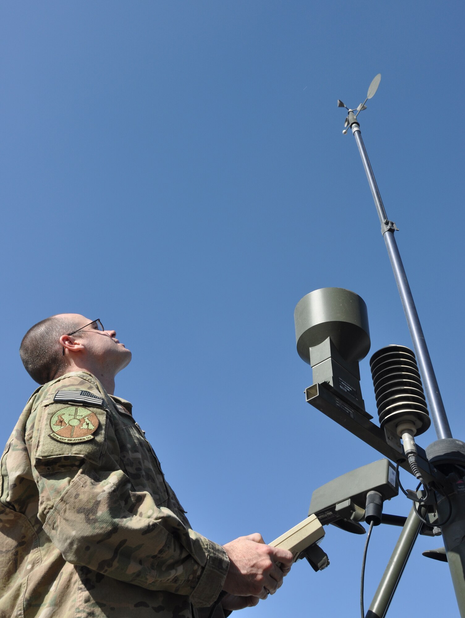 TSgt. Neel Rodgers, a Battlefield Weather Forecaster with 19th Expeditionary Weather Squadron, checks readings on the Tactical Meteorological Observing System (TMQ-53) June 30 at Bagram Field, Afghanistan. Weather forecasters use the system to get current weather conditions such as winds, temperature, humidity, range of visibility, cloud ceiling, and to detect lightning. Rodgers was recently named 455th Air Expeditionary Wing "Warrior of the Week."  According to Rodgers' peers, his knowledge and accurate anticipation of area weather patterns were instrumental in the successful completion of combat missions leading to interventions against 55 insurgents and the destruction of 82 Improvised Explosive Devices. (U.S. Air Force photo/TSgt Shawn David McCowan)