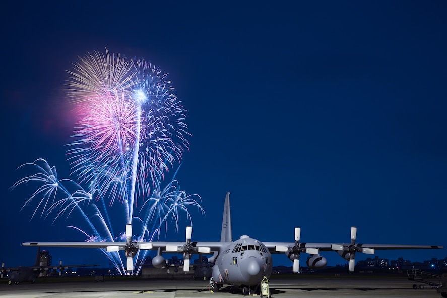 YOKOTA AIR BASE, Japan -- Fireworks burst over Yokota Air Base, Japan, on July 4, 2012, during Celebrate America. The 374th Force Support Squadron provided Yokota residents and their guests with events for all ages. The day kicked off with the Firecracker 5K run and a variety of activities throughout the day to include go karts, pony rides, live entertainment, food and fireworks. (U.S. Air Force photo illustration by Osakabe Yasuo)