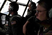 Air Force Reservists from the 302nd Airlift Wing manuever their Modular Airborne Fire Fighting System-equipped C-130 Hercules aircraft June 27 to the Waldo Canyon Fire near Colorado Springs, Colo. MAFFS is a self-contained aerial firefighting system that can discharge 3,000 gallons of water or fire retardant in less than five seconds, covering an area one-quarter of a mile long by 100 feet wide. The 302nd AW is based at Peterson Air Force Base, Colo. (U.S. Air Force photo/Staff Sgt. Stephany D. Richards)