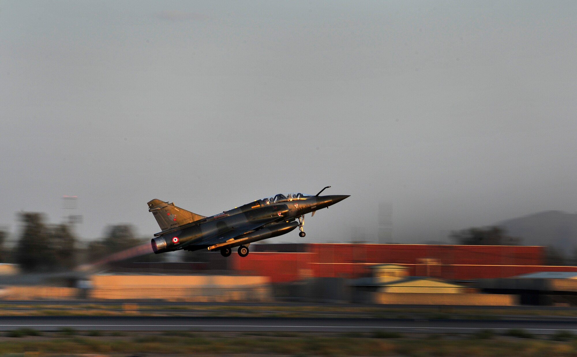 Members of the French Air Force, Detachment 3/3, in the Mirage 2000-D takeoff during a combat mission at Kandahar Airfield, Afghanistan, June 18, 2012. The French AF has been a coalition partner with the U.S. during Operation Enduring Freedom (OEF) and perform air to ground close air support missions for friendly ground forces.