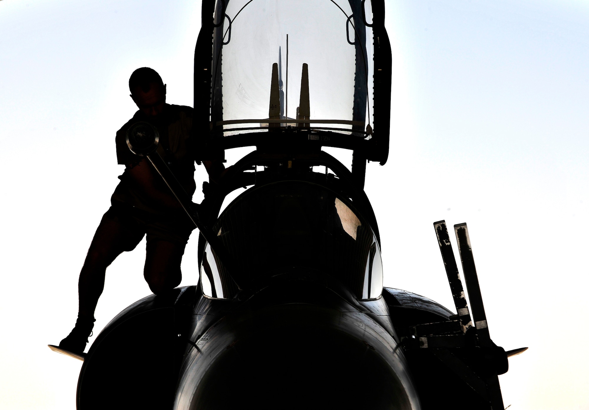 Members of the French Air Force, Detachment 3/3, perform maintenance inspections and checklists on a Mirage 2000-D before a combat mission at Kandahar Airfield, Afghanistan, June 15, 2012. The French AF has been a coalition partner with the U.S. during Operation Enduring Freedom (OEF) and perform air to ground close air support missions for friendly ground forces. (U.S. Air Force photo/Staff Sgt. Clay Lancaster)
