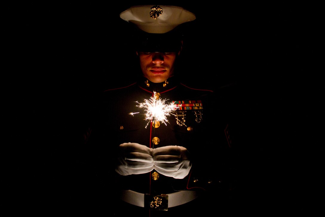Sgt. Geovanni Cruz, 28, from New Britain, Conn., celebrates Independence Day on July 4. Cruz is a motor transportation mechanic with Marine Wing Support Squadron 471.
