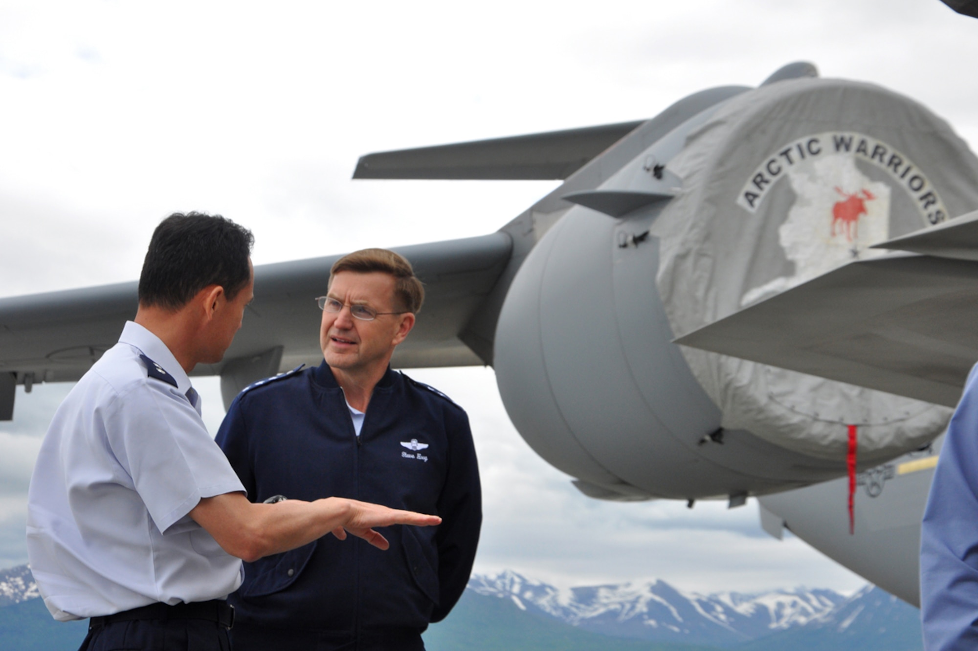 JOINT BASE ELMENDORF-RICHARDSON, Alaska --  Lt. Gen. Stephen Hoog, Alaskan Command commander, speaks with an executive observer during a flightline tour for this years Red Flag-Alaska Executive Observer Program June 15. General Gary North, Pacific Air Forces commander, and Hoog hosted this years program. During the program, North, as well as several executive observers, participated in presentations and discussions on how the U.S. Air Force integrates and synchronizes service capabilities, resources and effects to meet national challenges. (U.S. Air Force photo by Staff Sgt. Cynthia Spalding)
