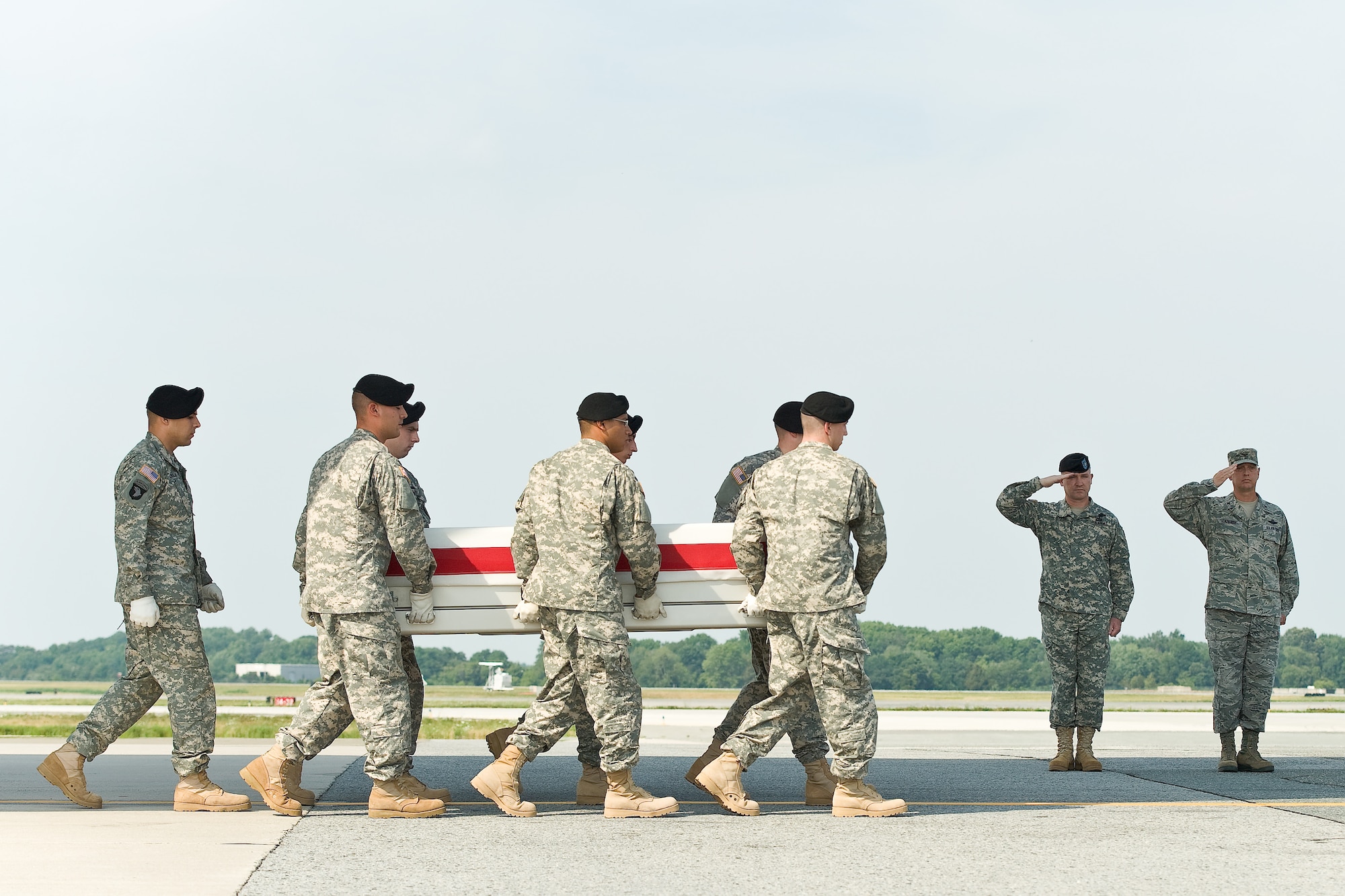 A U.S. Army carry team transfers the remains of Army Staff Sgt. Raul M. Guerra, of Union City, N.J., at Dover Air Force Base, Del., July 5, 2012. Guerra was assigned to the 502nd Military Intelligence Battalion, 201st Military Intelligence Brigade, Fort Lewis, Wash. (U.S. Air Force photo/Roland Balik)
