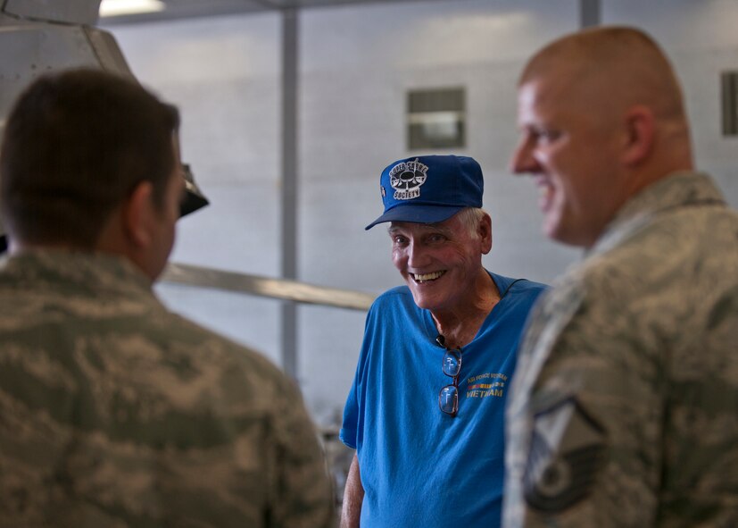 U.S. Air Force retired Master Sgt. Carl Hackworth speaks to Airmen about the F-86L Sabre and his time as a crew chief in the 1950s at the fabrication flight June 11, 2012, at Moody Air Force Base, Ga. Hackworth visited the base to see the refurbishment progress of the F-86 since its move from downtown Valdosta. (U.S. Air Force photo by Senior Airman Eileen Meier/Released)