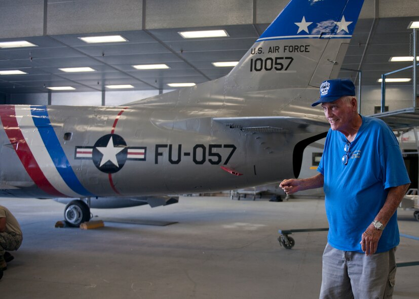 U.S. Air Force retired Master Sgt. Carl Hackworth speaks about what it was like working on the F-86L Sabre as a crew chief back in the 1950s at the fabrication flight June 11, 2012, at Moody Air Force Base, Ga. Hackworth got a first-hand look of the refurbishment on the aircraft and was pleased with the restoration project’s progress. (U.S. Air Force photo by Senior Airman Eileen Meier/Released)