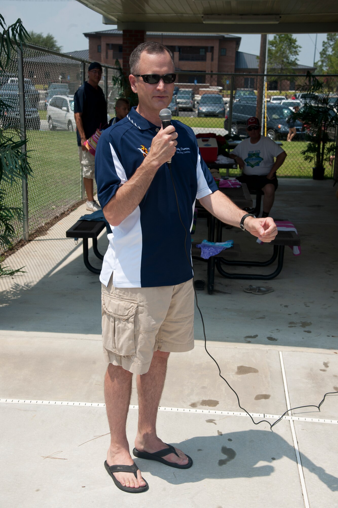 U.S. Air Force Col. Billy Thompson, 23d Wing commander, speaks during an Independence Day celebration at the base pool at Moody Air Force Base, Ga., July 4, 2012. Thompson thanked everyone for coming out for the event, talked about the importance of July Fourth and reminded everyone to keep those deployed in their prayers. (U.S. Air Force photo by Airman 1st Class Paul Francis/Released) 