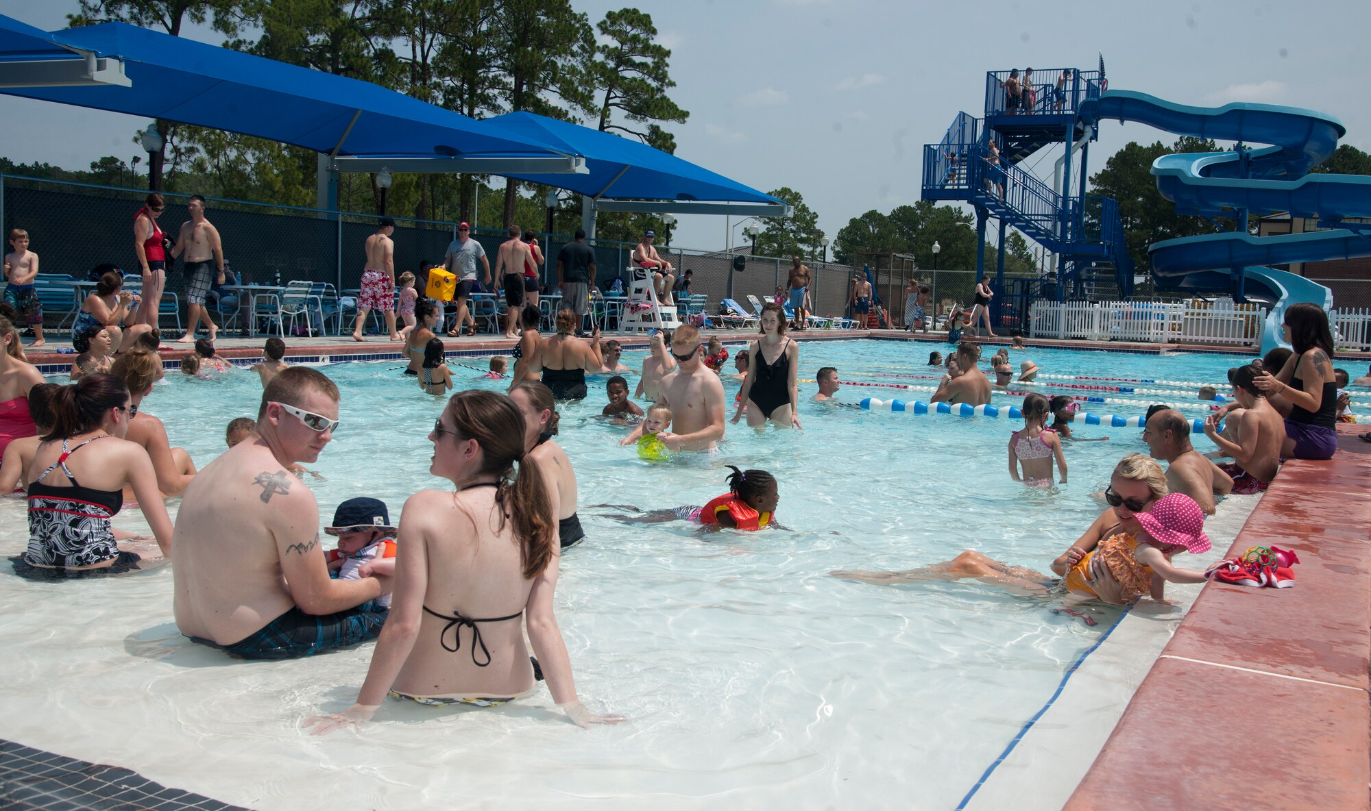 Families of Moody Air Force Base, Ga., attend the base pool for an Independence Day celebration and cookout July 4, 2012. Families got to enjoy a day in the sun and relax with food provided by the base. (U.S. Air Force photo by Airman 1st Class Paul Francis/Released)
