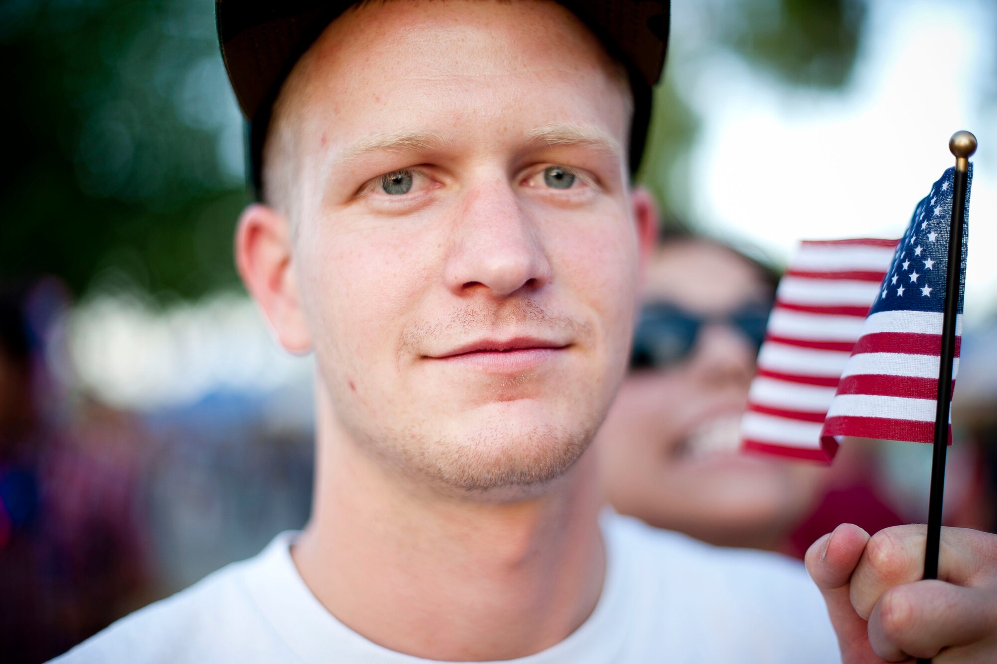 Senior Airman Johnathan McKee, 39th Maintenance Squadron, celebrates Independence Day July 4, 2012, at Arkadas Park on Incirlik Air Base, Turkey. The event, which was hosted by the 39th Force Support Squadron, offered members of Team Incirlik an opportunity to celebrate Independence Day despite being away from the United States. (U.S. Air Force photo by Senior Airman William A. O'Brien/Released)