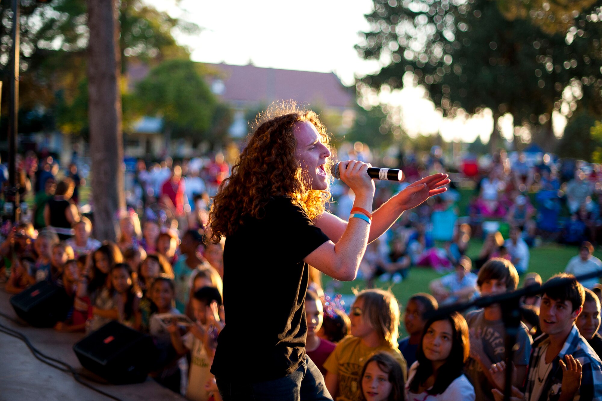 American Idol contestant Brett Loewenstern performs during an Independence Day celebration July 4, 2012, at Arkadas Park on Incirlik Air Base, Turkey. The event included a performance from six members of the American Idol tour. (U.S. Air Force photo by Senior Airman William A. O'Brien/Released)