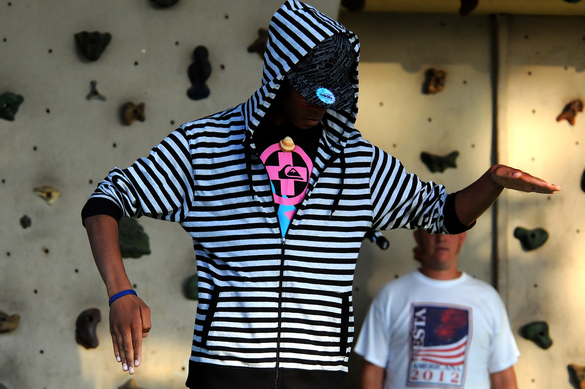 A teen performs a dance routine during the Independence Day celebration July 4, 2012, at Incirlik Air Base, Turkey. Winners of the U Got Talent and Incirlik Idols talent competitions held in the spring were given the opportunity to perform as opening acts for the American Idols tour at the celebration.  (U.S. Air Force photo by Senior Airman Marissa Tucker/Released)
