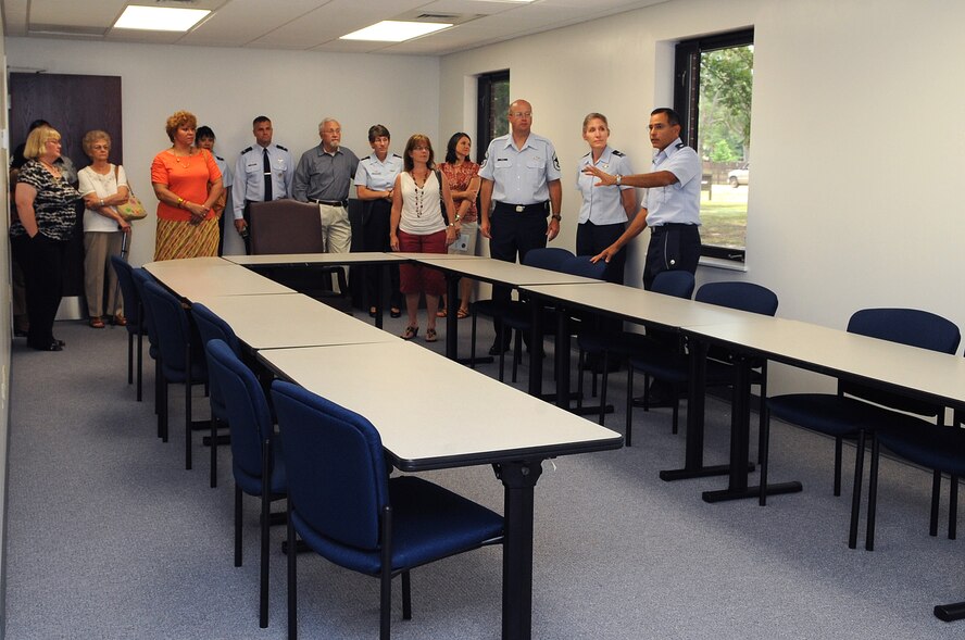 U.S. Air Force Chap. (Lt. Col.) William O’Sullivan leads a tour of the Family Life Center expansion on Seymour Johnson Air Force Base, N.C., July 2, 2012. New classrooms and conference rooms are available for official use by base groups and agencies, and can be reserved through the chapel office. O’Sullivan is the 4th Fighter Wing head chaplain. (U.S. Air Force photo/Airman 1st Class Aubrey Robinson/Released)