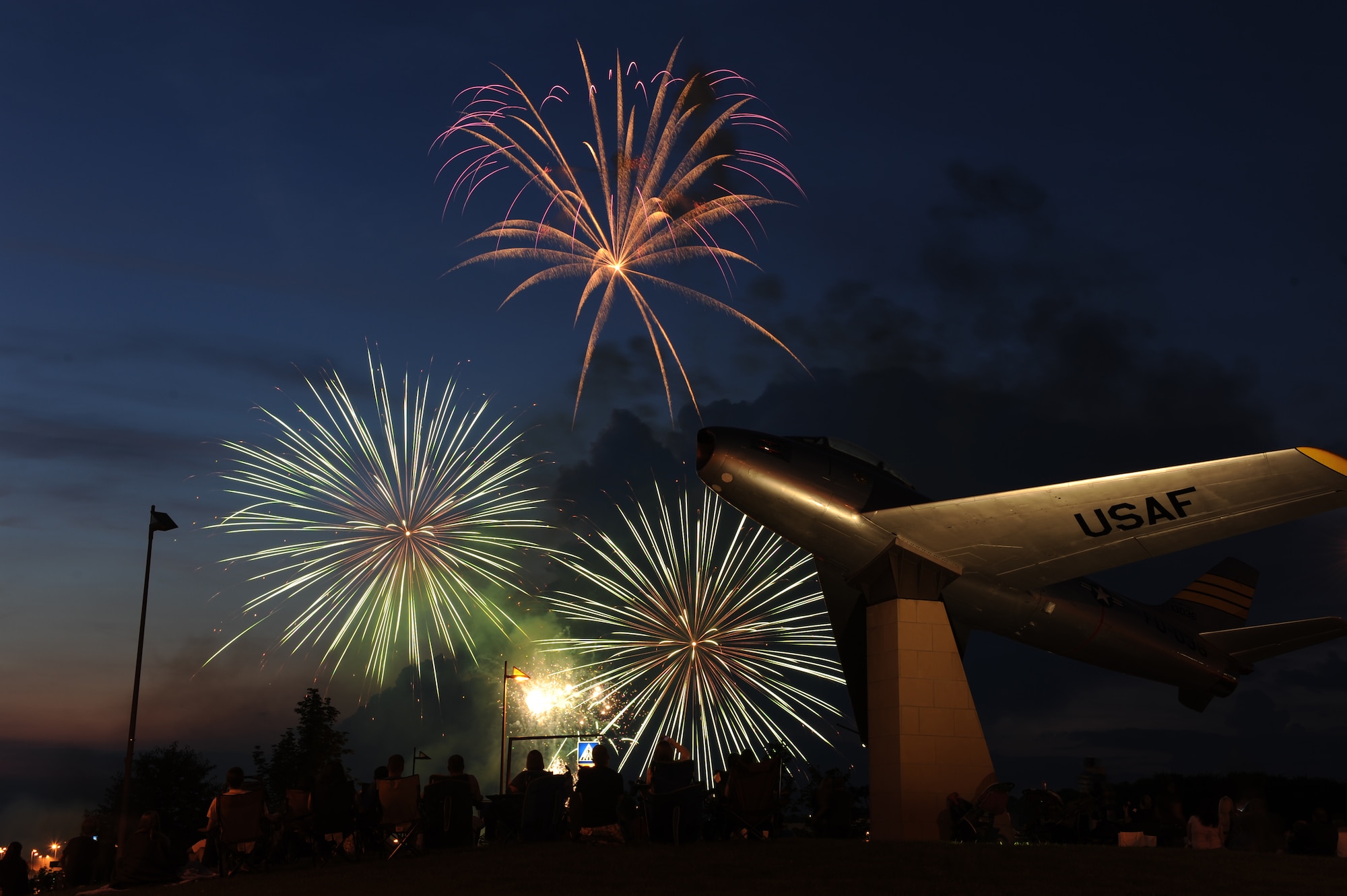 SPANGDAHLEM AIR BASE, Germany – Fireworks explode in the sky during Super Saber Appreciation Day here July 4. The day included a number of activities including pony rides, a carousel and swings, and two bouncy castles were available for younger children. The 52nd Force Support Squadron sponsored the event to celebrate Independence Day and show appreciation to the 52nd Fighter Wing community. (U.S. Air Force photo by Senior Airman Matthew B. Fredericks/Released)