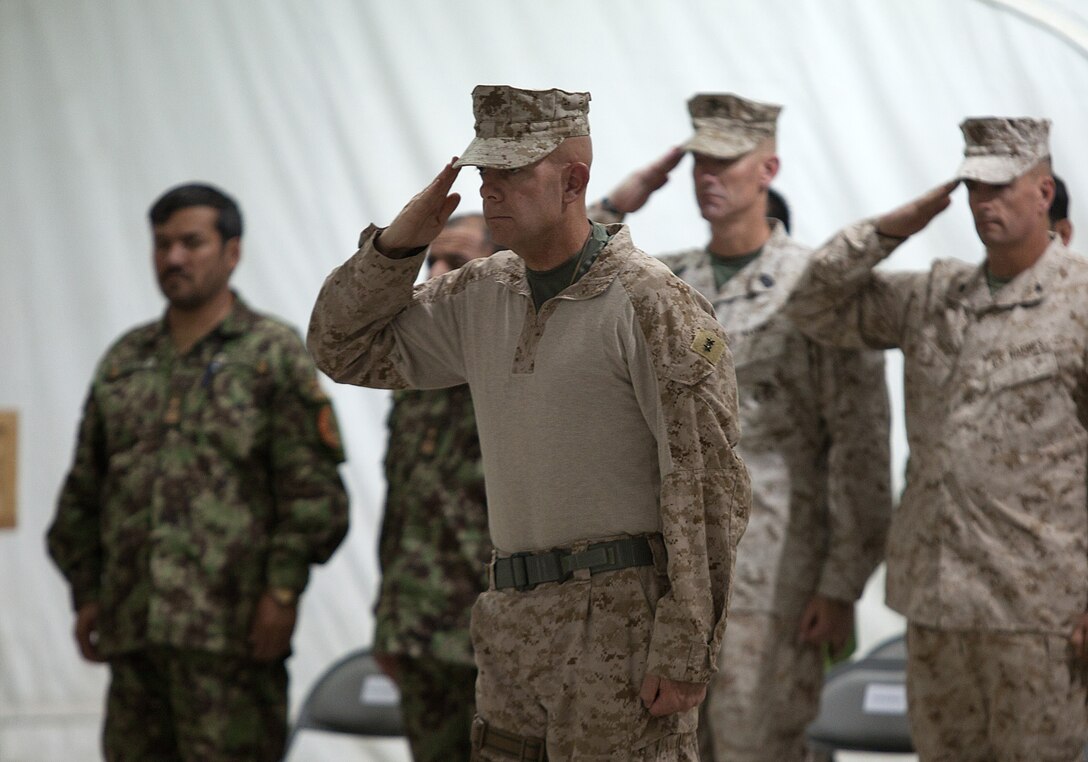 Lt. Cmdr. Kevin Smith, Ridgefield, Wash., with 4th Dental Co. displays a recently extracted tooth from Lance Cpl. Paul J. Youngberry, of Seattle, during Exercise Javelin Thrust 2012. Javelin Thrust is an annual large-scale exercise here which allows active and reserve Marines and sailors from 38 different states to train together as a seamless Marine Air Ground Task Force.
