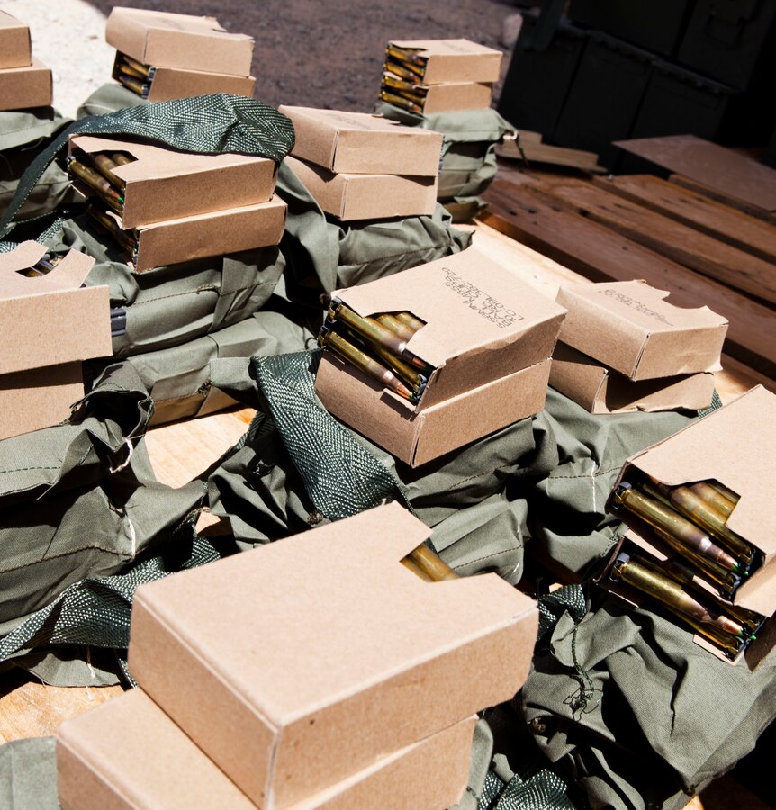 5.56 mm ammunition is staged for 4th Combat Engineer Battalion Marines prior to Enhanced Marksmanship Training at Range 107. Javelin Thrust is an annual large-scale exercise here which allows active and reserve Marines and sailors from 38 different states to train together as a seamless Marine Air Ground Task Force.