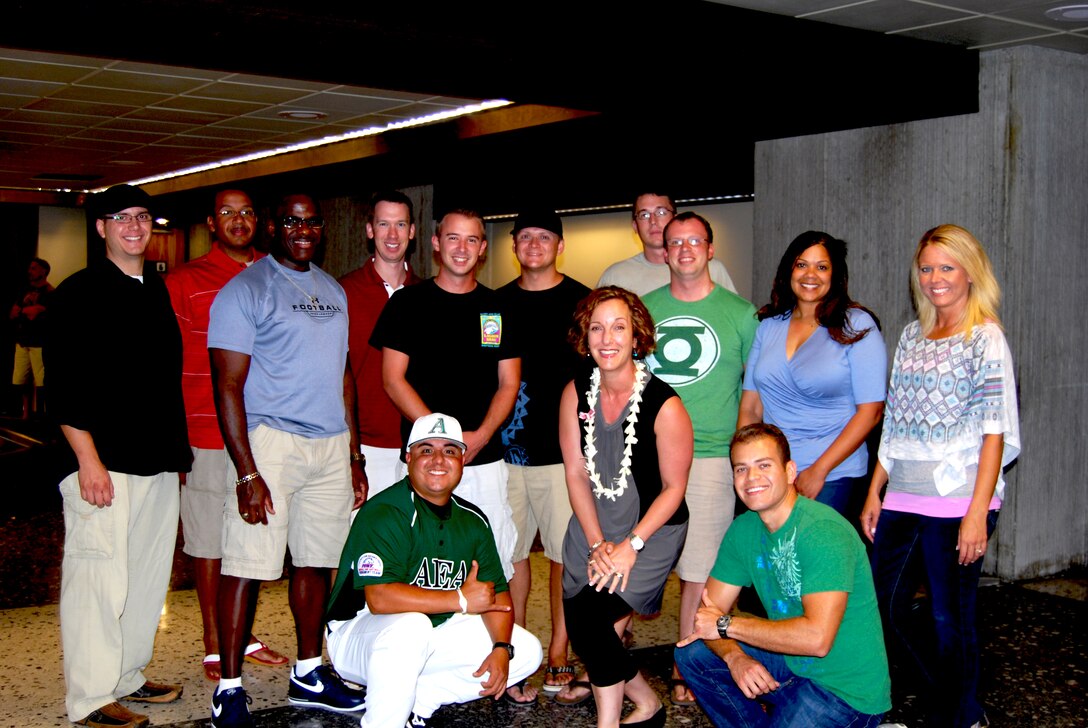 CMSgt Laura Noel is greeted by the members of the USAF Band of the Pacific-Hawaii at Honolulu International Airport.