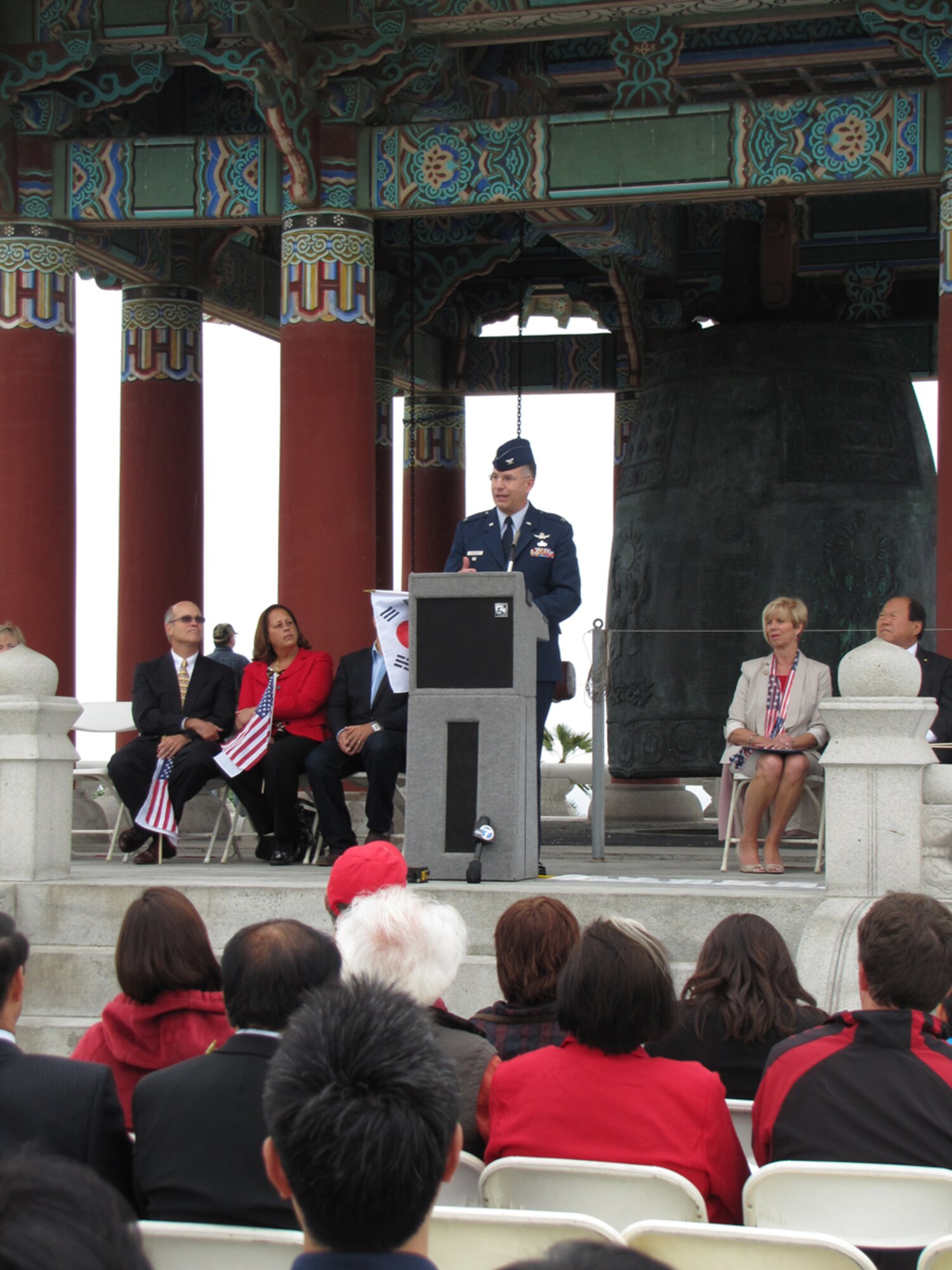Colonel Arnold Streland, SMC’s Space Superiority Systems director,  welcomes dignitaries and guests at the 53rd Annual Korean Bell 4th of July Celebration in San Pedro, Calif.  The bell was a gift to the United States from the Republic of Korea to mark the U.S. Bicentennial in 1976. (Photo by Lynn Kirby)