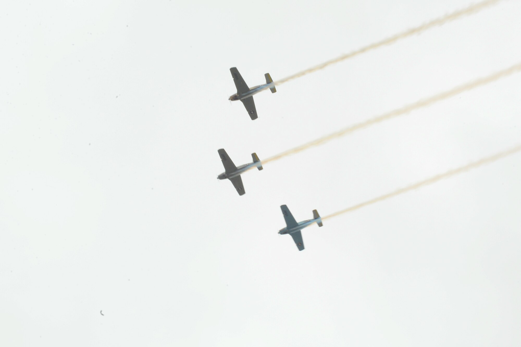 Vintage aircraft fly over the Huntington Beach 4th of July parade route.  Lieutenant Gen. Ellen Pawlikowski, SMC commander, was the military grand marshal. (Photo by Sarah Corrice) 