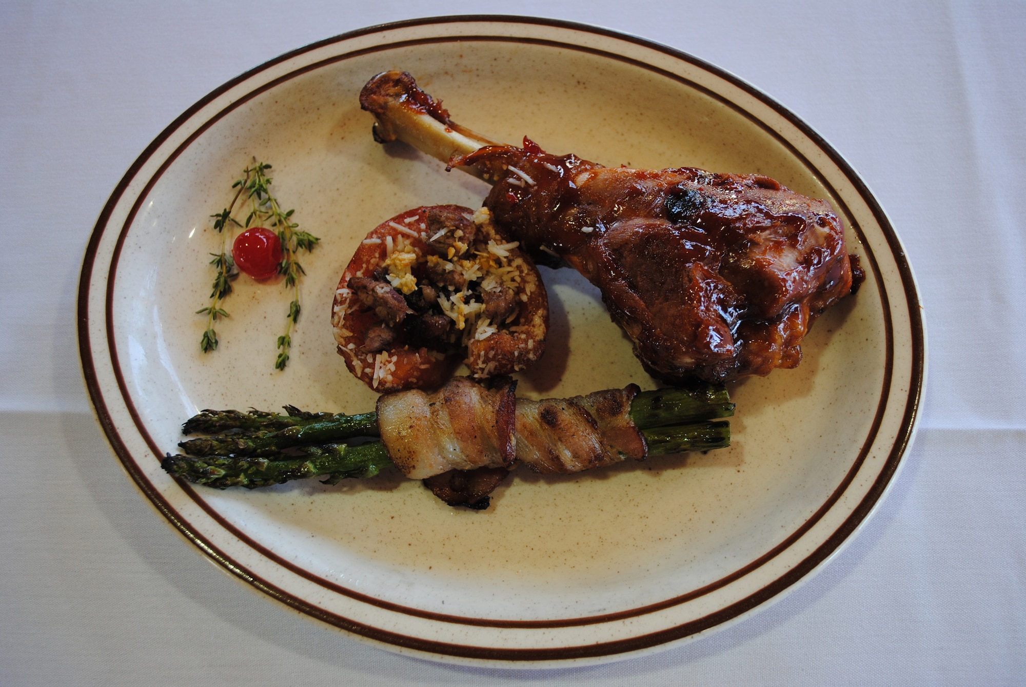 The entrée scoring the most points from the judges and earning first place was barbecue turkey drumsticks, bacon with asparagus and garlic roasted tomatoes. Airman 1st Class Kyle Murphy and Edward Hurtado, 10th Missile Squadron missile chefs, created the dish. (U.S. Air Force photo/Airman 1st Class Katrina Heikkinen)