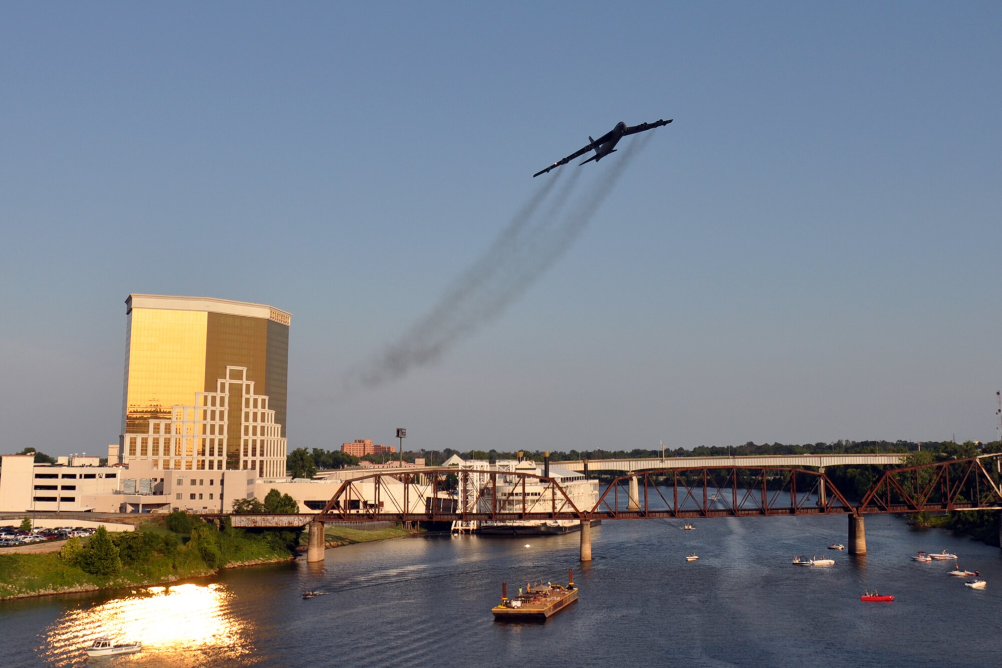 A B-52 Stratofortress from the 93rd Bomb Squadron at Barksdale Air Force Base performs a flyover for the Independence Day Festival in Shreveport, La., July 4, 2012. The celebration at Riverview Park featured many types of food and beverage vendors, and music from Collin Raye. The aircrew consisted of Col. Keith Schultz, the pilot from Bossier City, La., Maj. Tony Fyke, the co-pilot from Brookville, Ohio, Maj.  Noel Beavers, the radar navigator from Burgettstown, Pa., and Capt. Leslie Pointon, the intel officer, who hails from San Ramon, Calif. (Courtesy photo by Roy Bell)