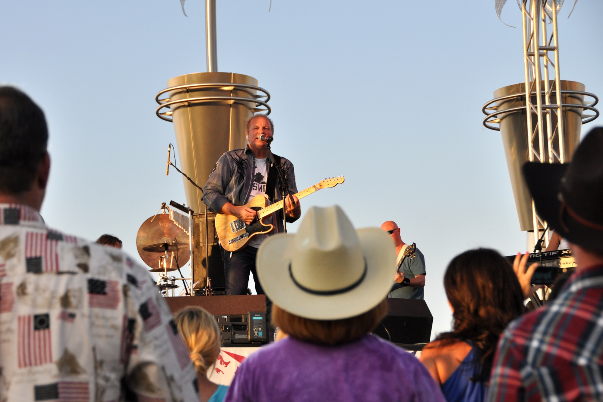 American country music singer Collin Raye performs for a crowd of thousands during a concert that was part of the commemoration of our nation’s birthday at the Independence Day celebration in Shreveport, La., July 4, 2012. The celebration at Riverview Park featured many types of food and beverage vendors, a concert and a flyover by a B-52 Stratofortress from the 307th Bomb Wing at Barksdale Air Force Base. La. (U.S. Air Force photo by Master Sgt. Jeff Walston)